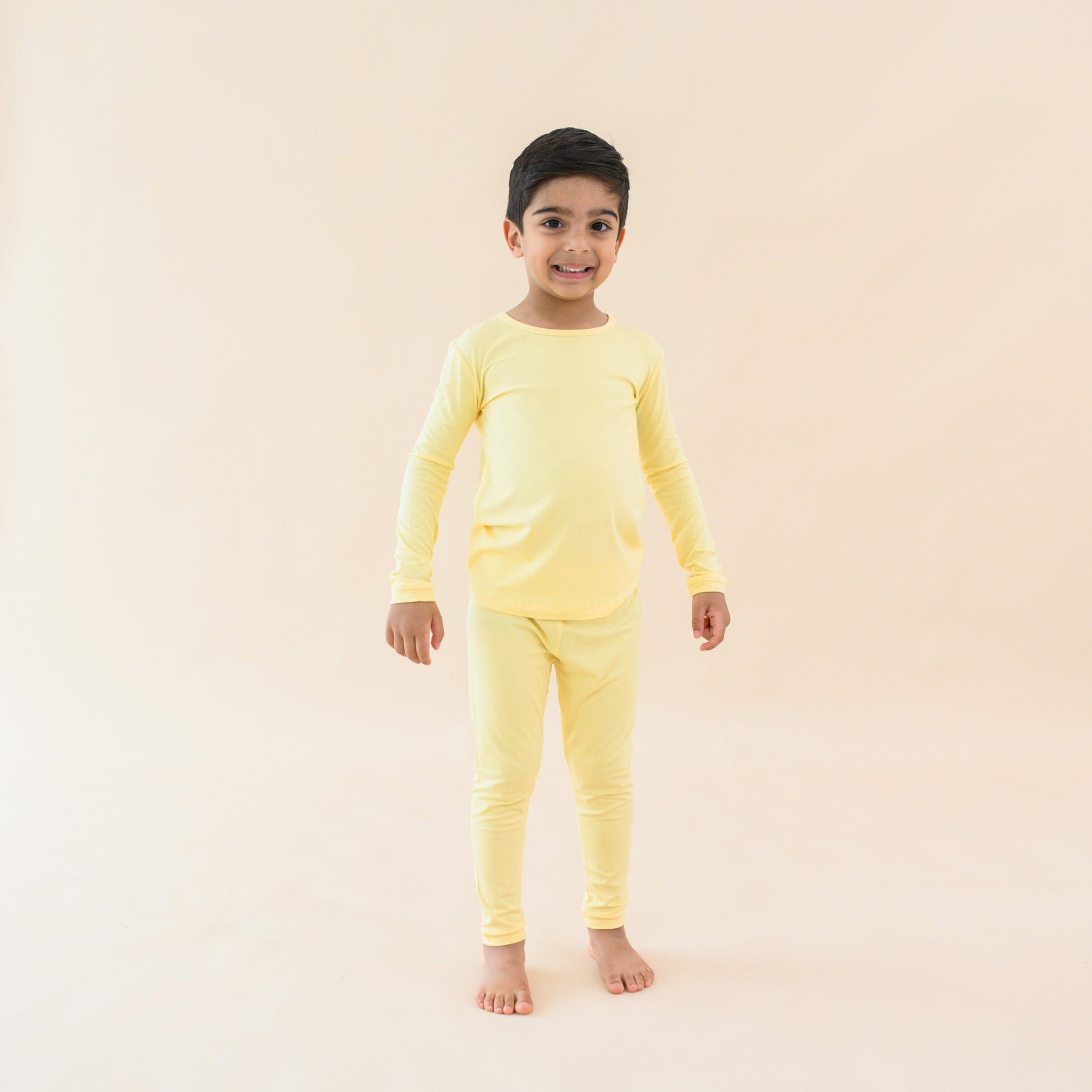 toddler modeling lilikoi long sleeve pajamas