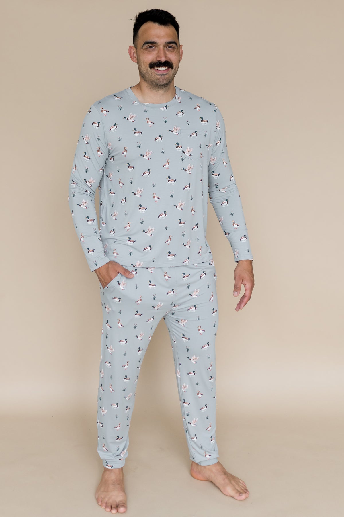 Male modeling the Men's Jogger Set in Mallard Duck with one hand in the pants pocket