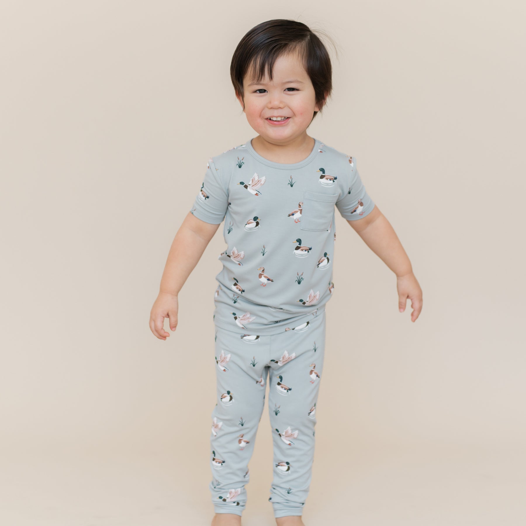 Young boy wearing the Short Sleeve with Pants Pajamas in Mallard Duck