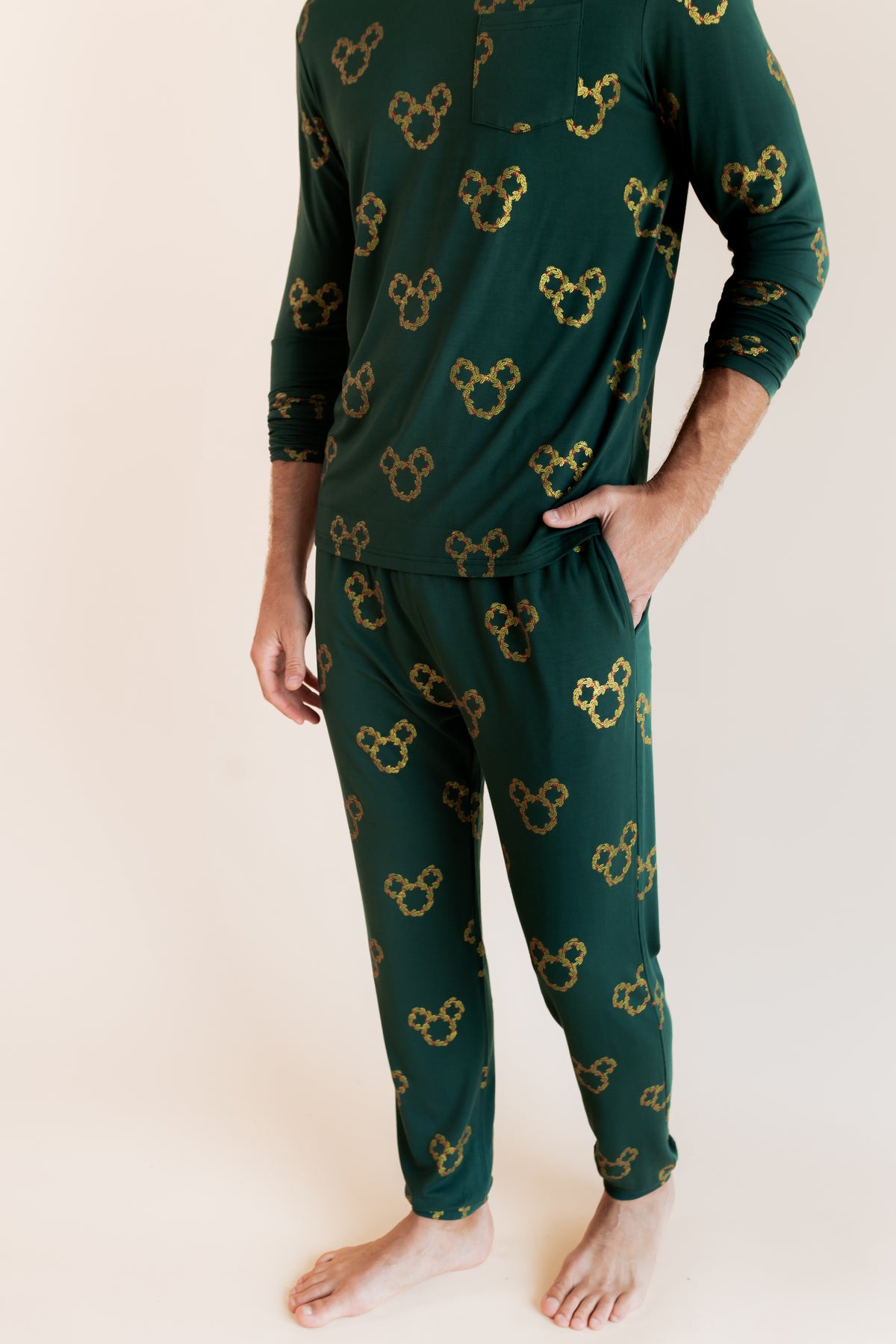 Modal showcasing pockets on Men's Jogger Set in Mickey Christmas Wreath print on a beige background