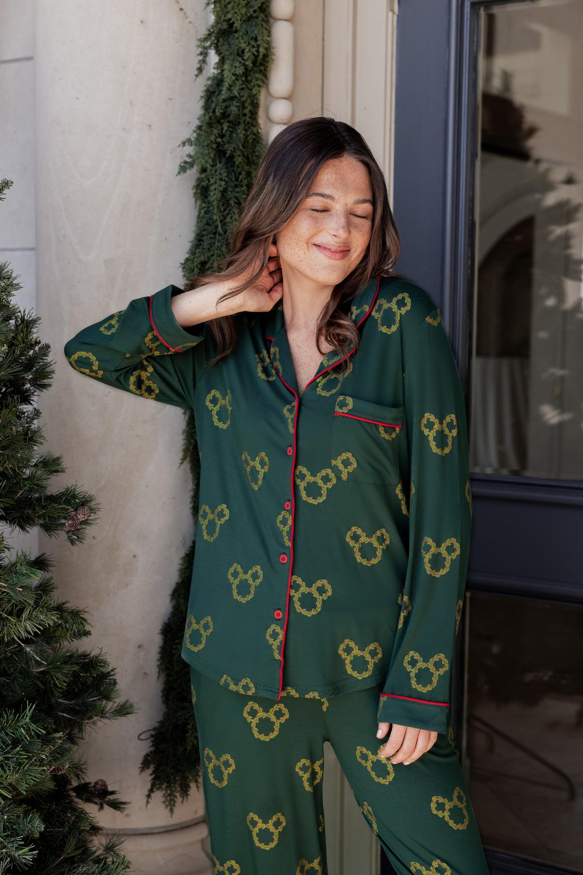 Women wearing Long-Sleeved Women's Pajama Set in Mickey Christmas Wreath print outdoors
