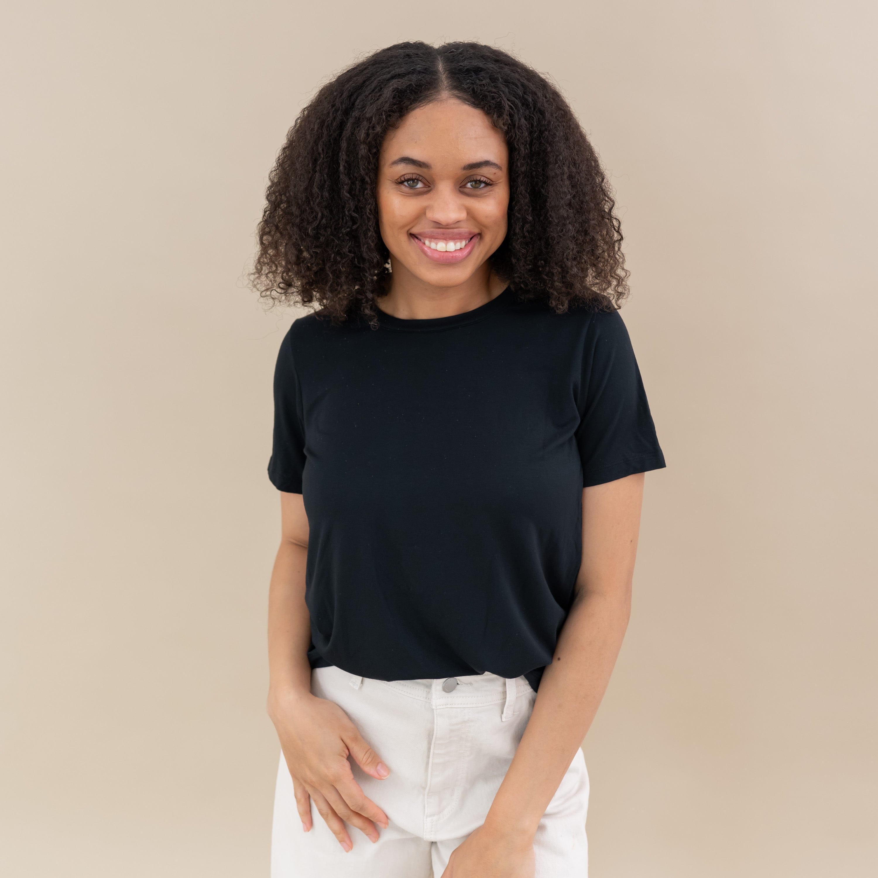 Woman modeling Women's Crew Neck Tee in Midnight