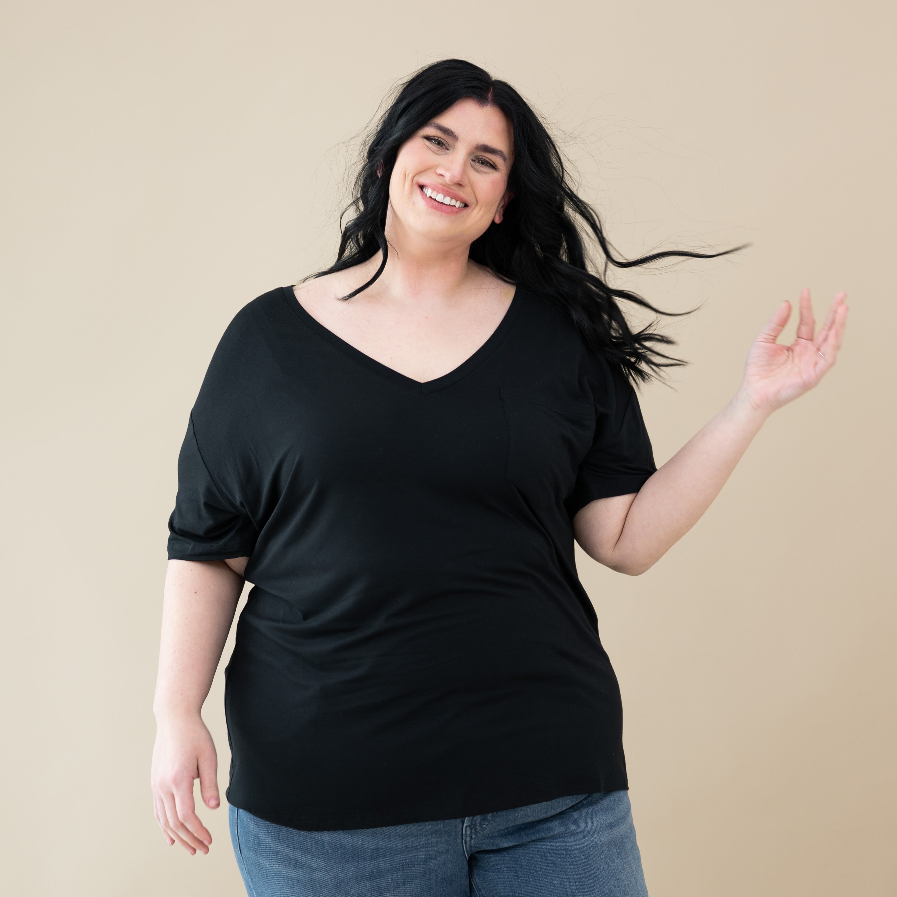Woman modeling Women’s Relaxed Fit V-Neck in Midnight