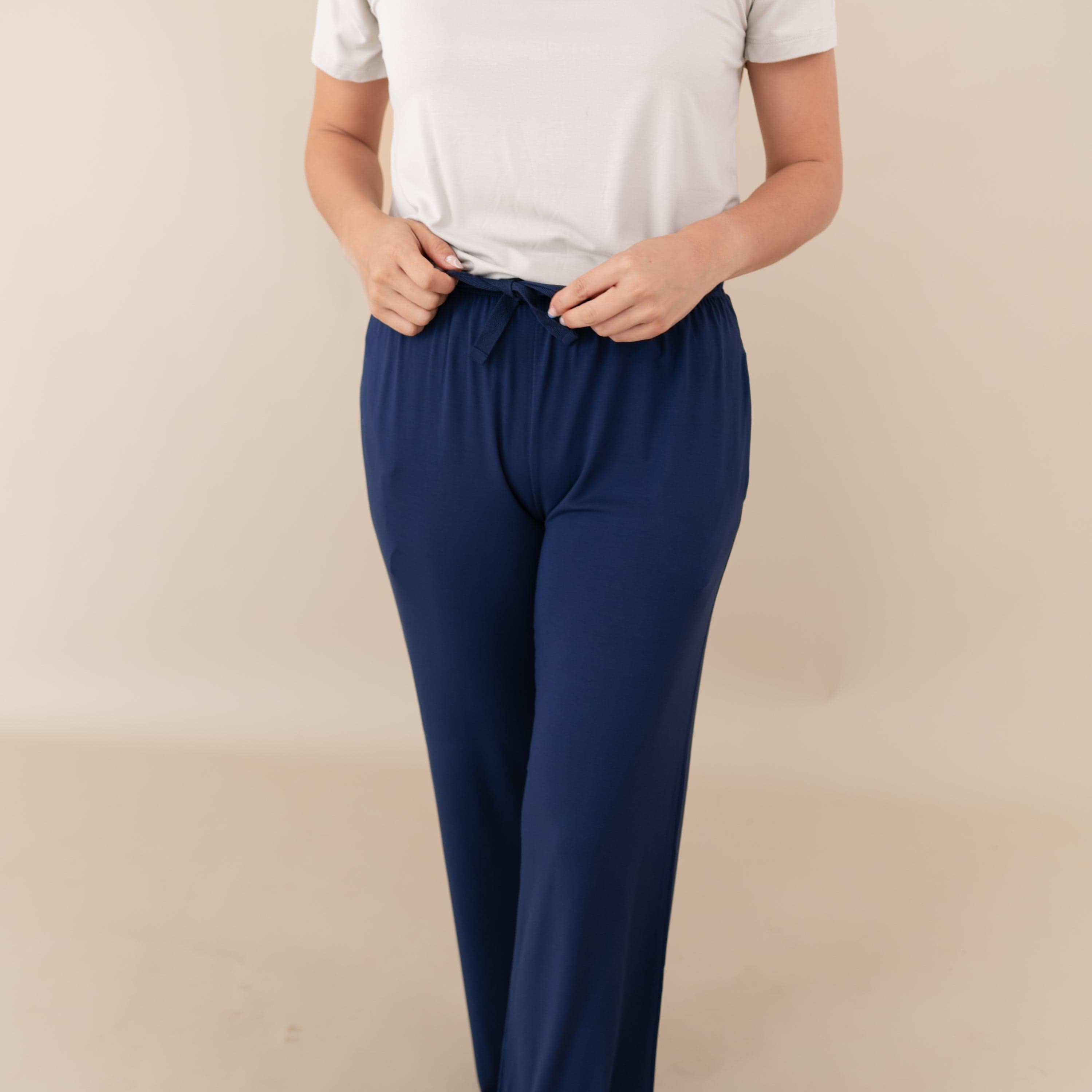 Woman modeling Women's Lounge Pants in Navy close up on pant's tie waist