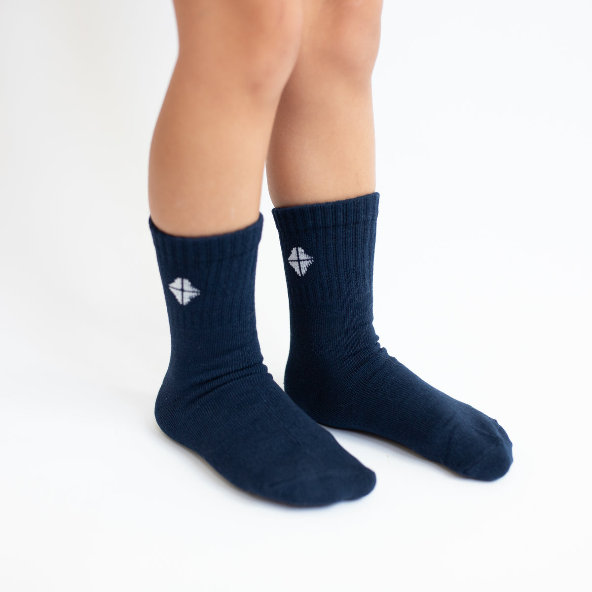 Crew Socks in Navy shown on a toddler model