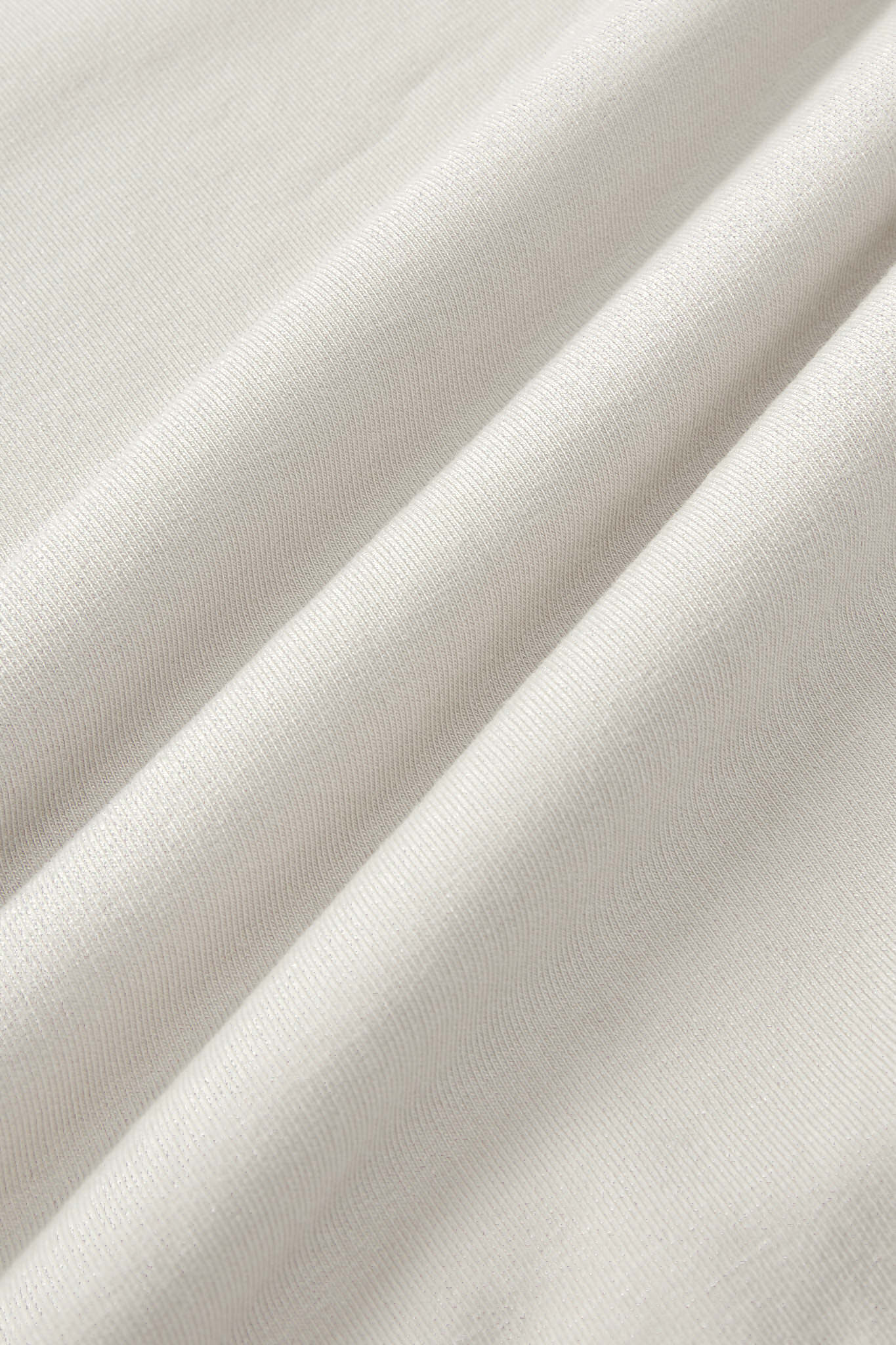 Close up image of oat color fabric