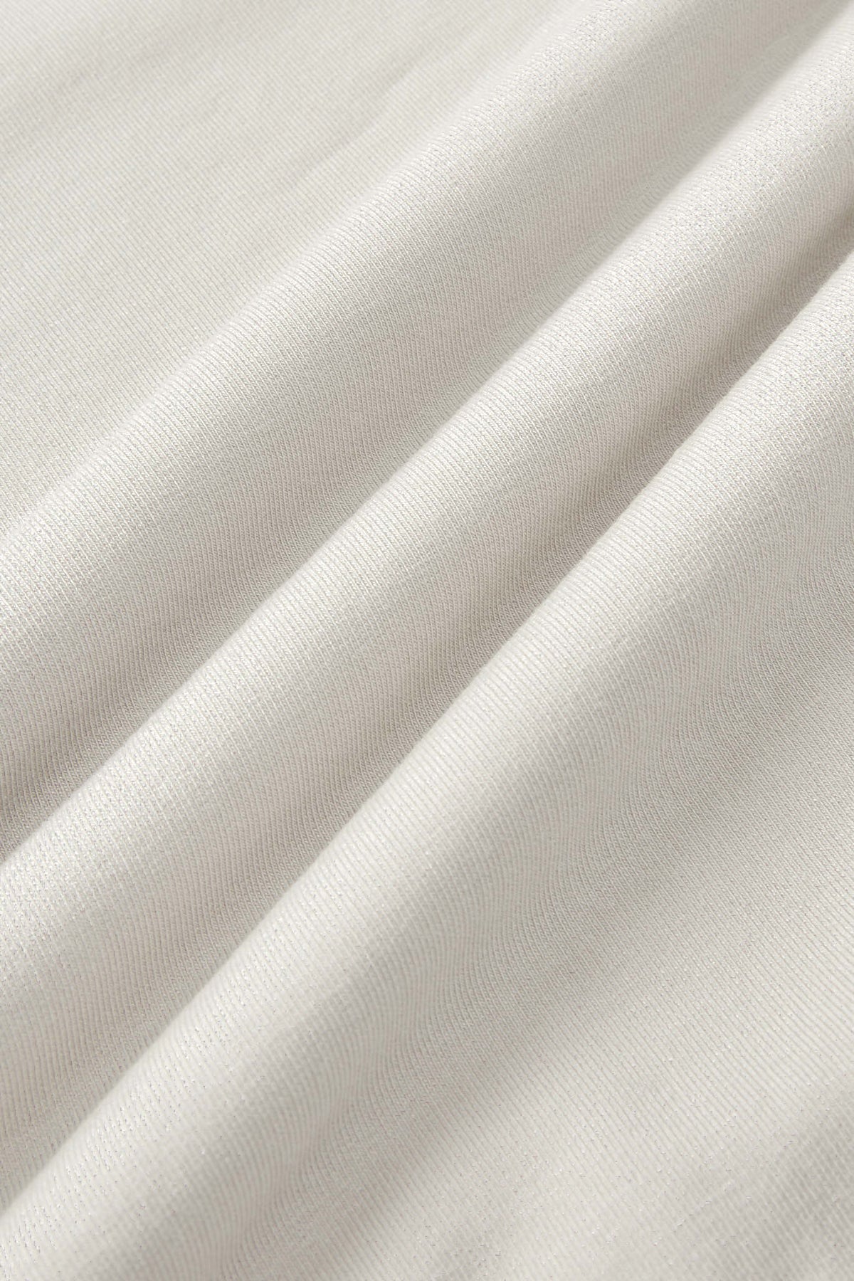 Close up image of oat color fabric