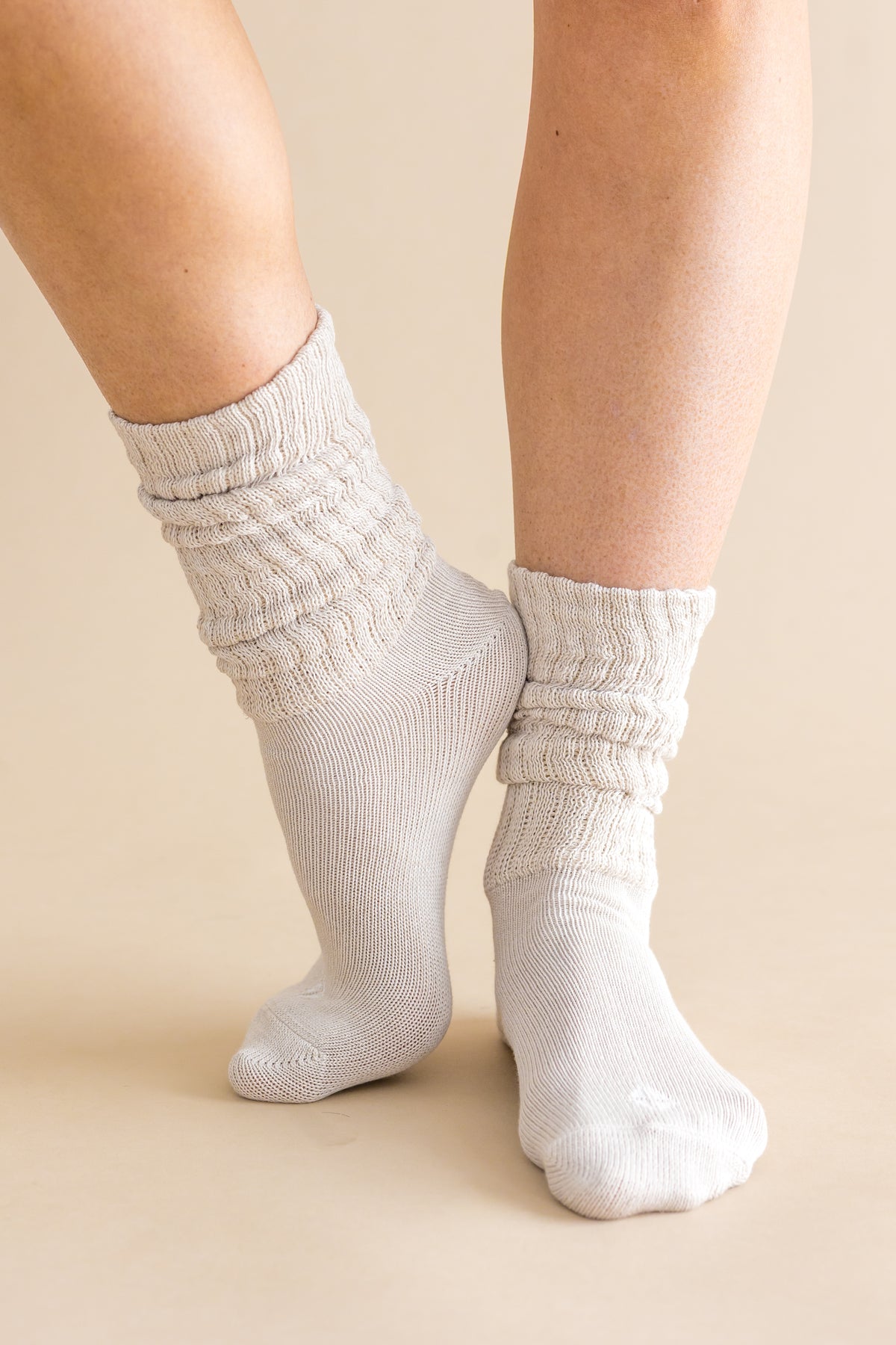 Adult Scrunch Socks in Oat shown on models feet