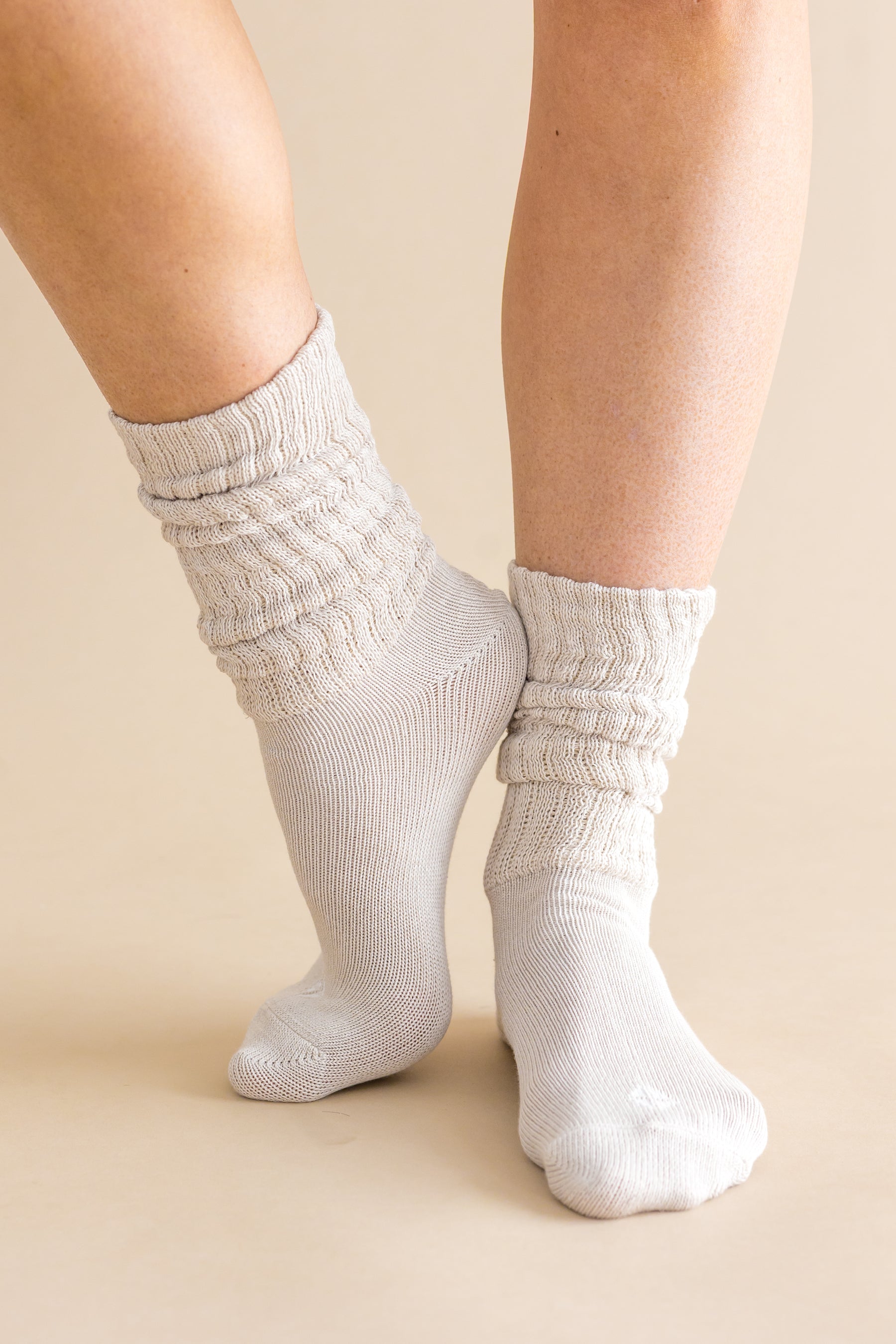 Adult Scrunch Socks in Oat shown on models feet