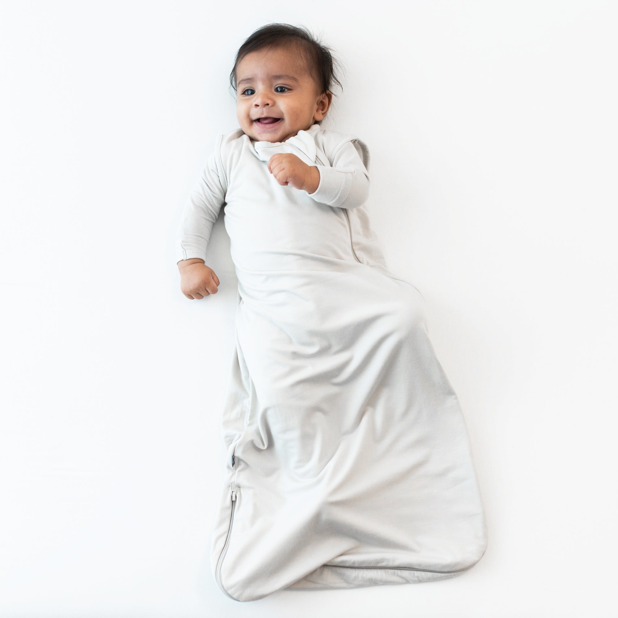 Baby in 0.5 TOG oat sleep bag