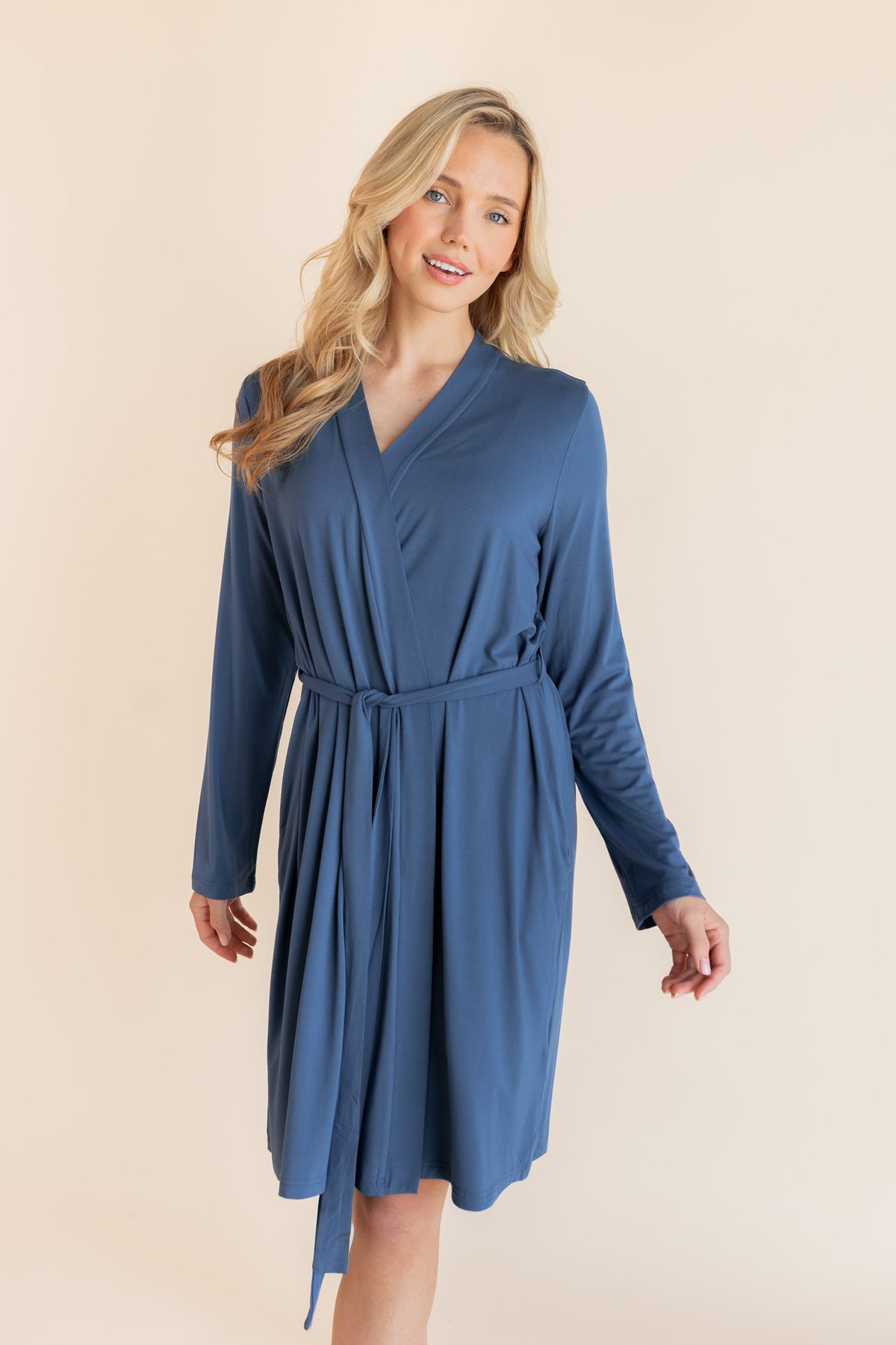Model wearing Women's Lounge Robe in Oxford on a beige background