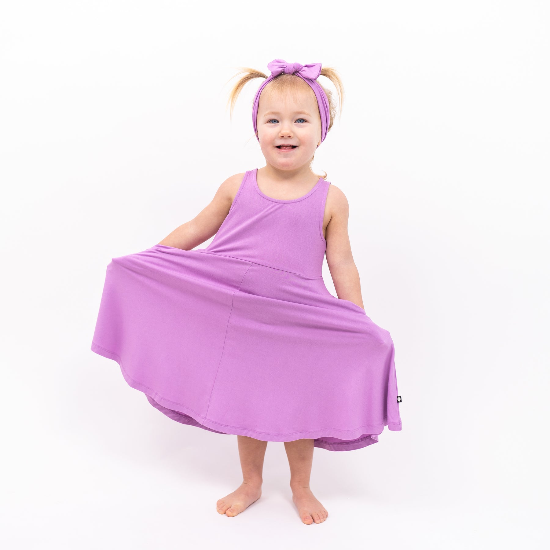 Toddler modeling Tank Twirl Dress in Poi