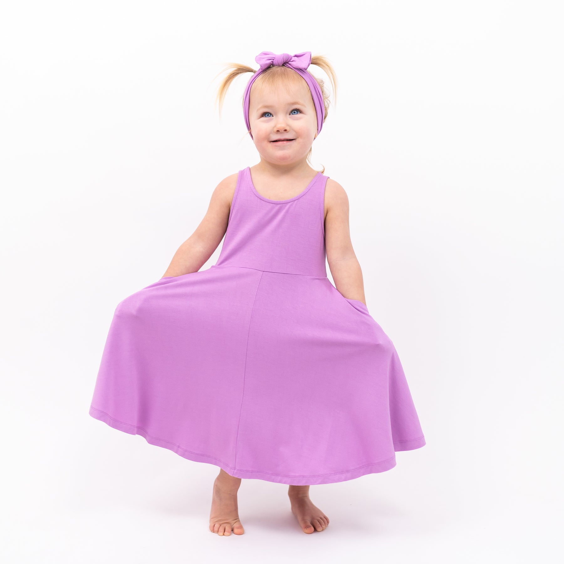 Toddler modeling Tank Twirl Dress in Poi