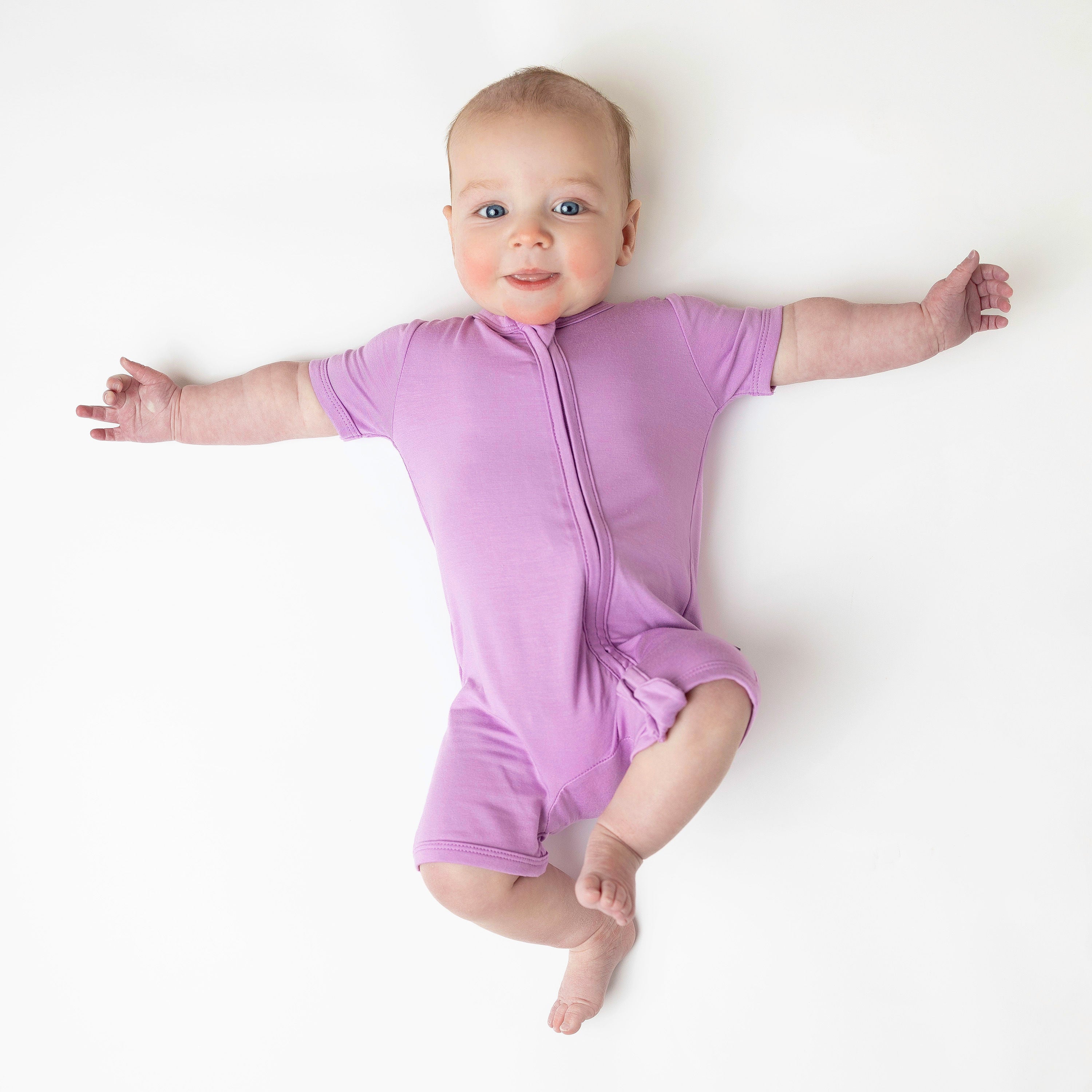 Baby modeling Zipper Shortall Romper in Poi