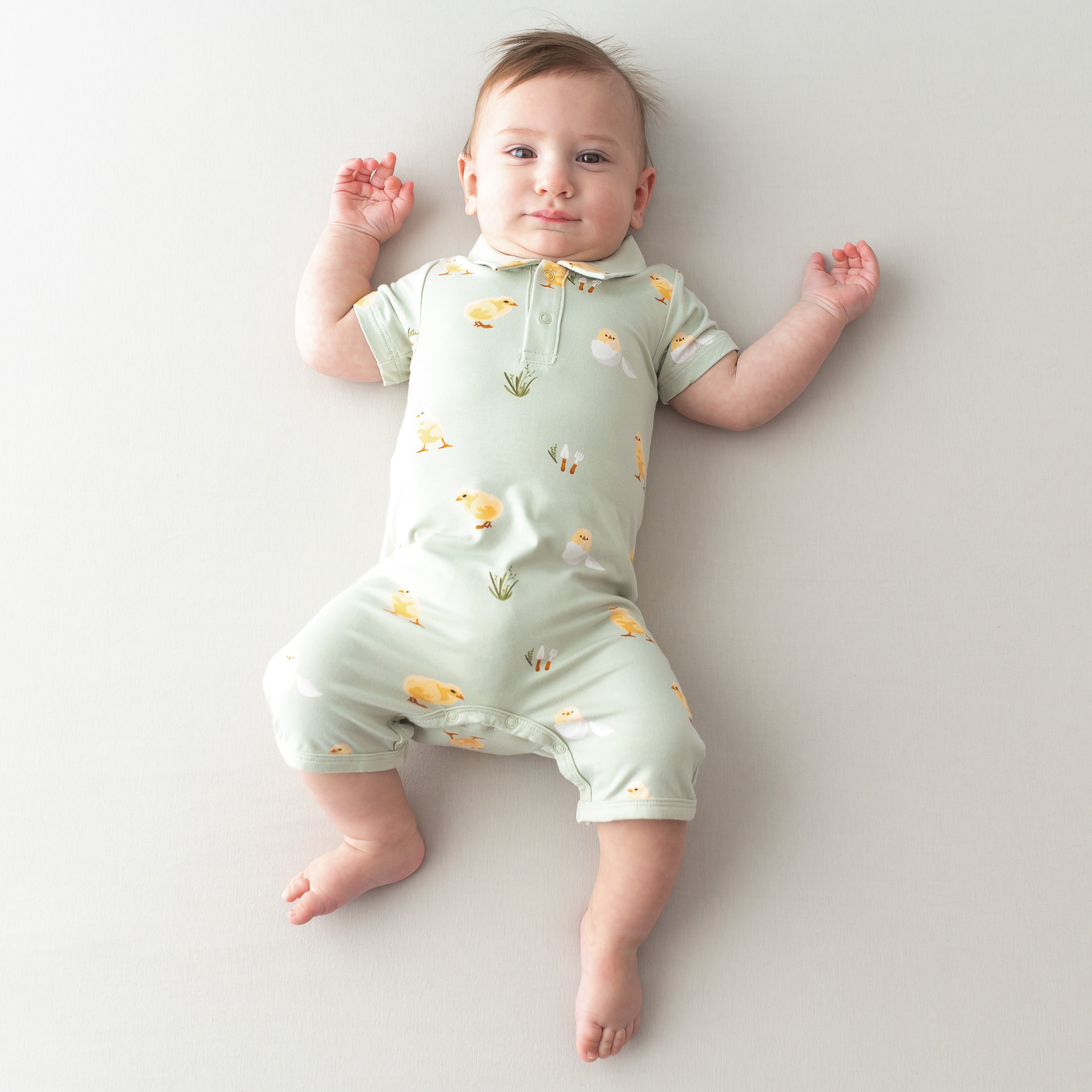 Baby modeling Polo Shortall in Aloe Chick