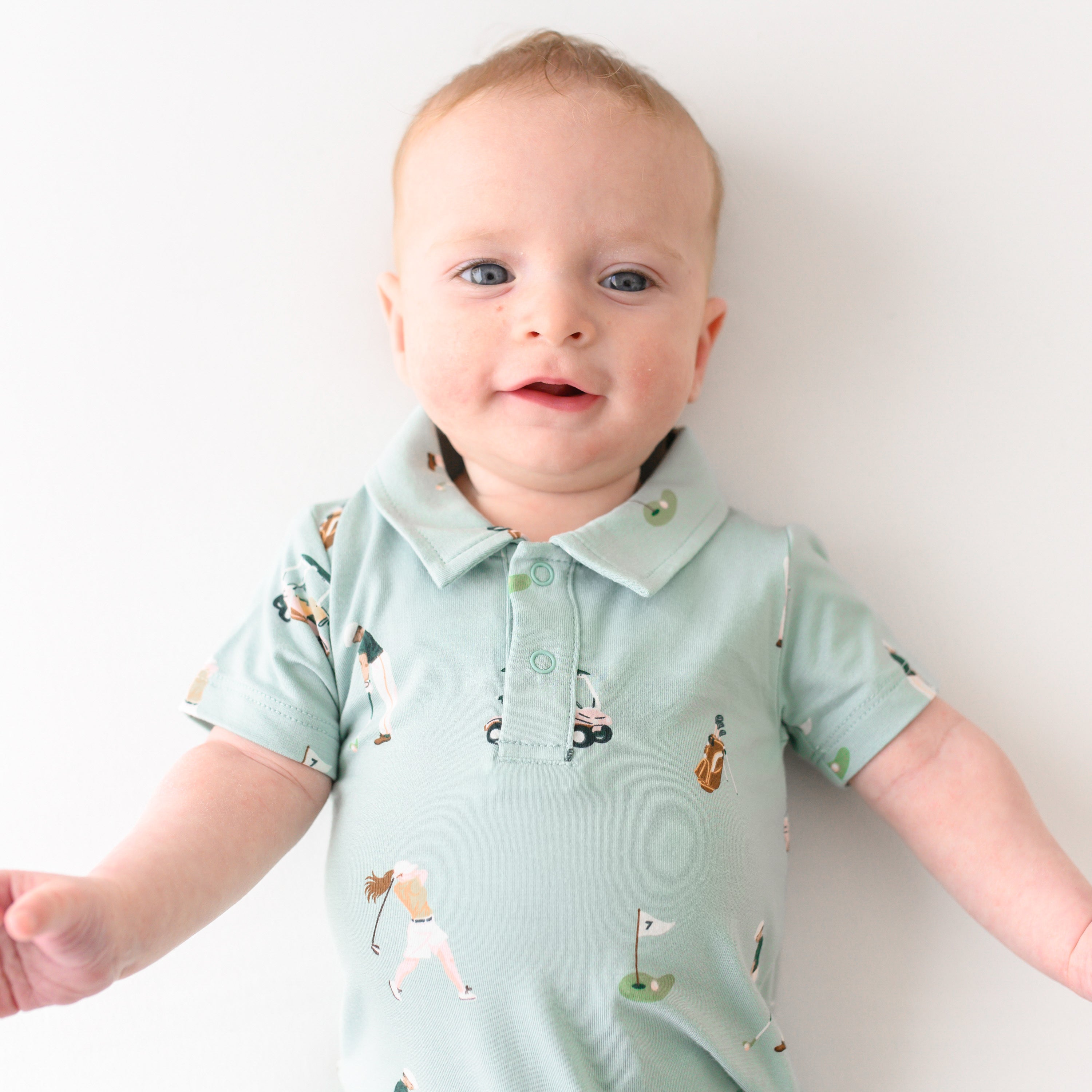 Baby wearing Polo Shortall in Golf close up