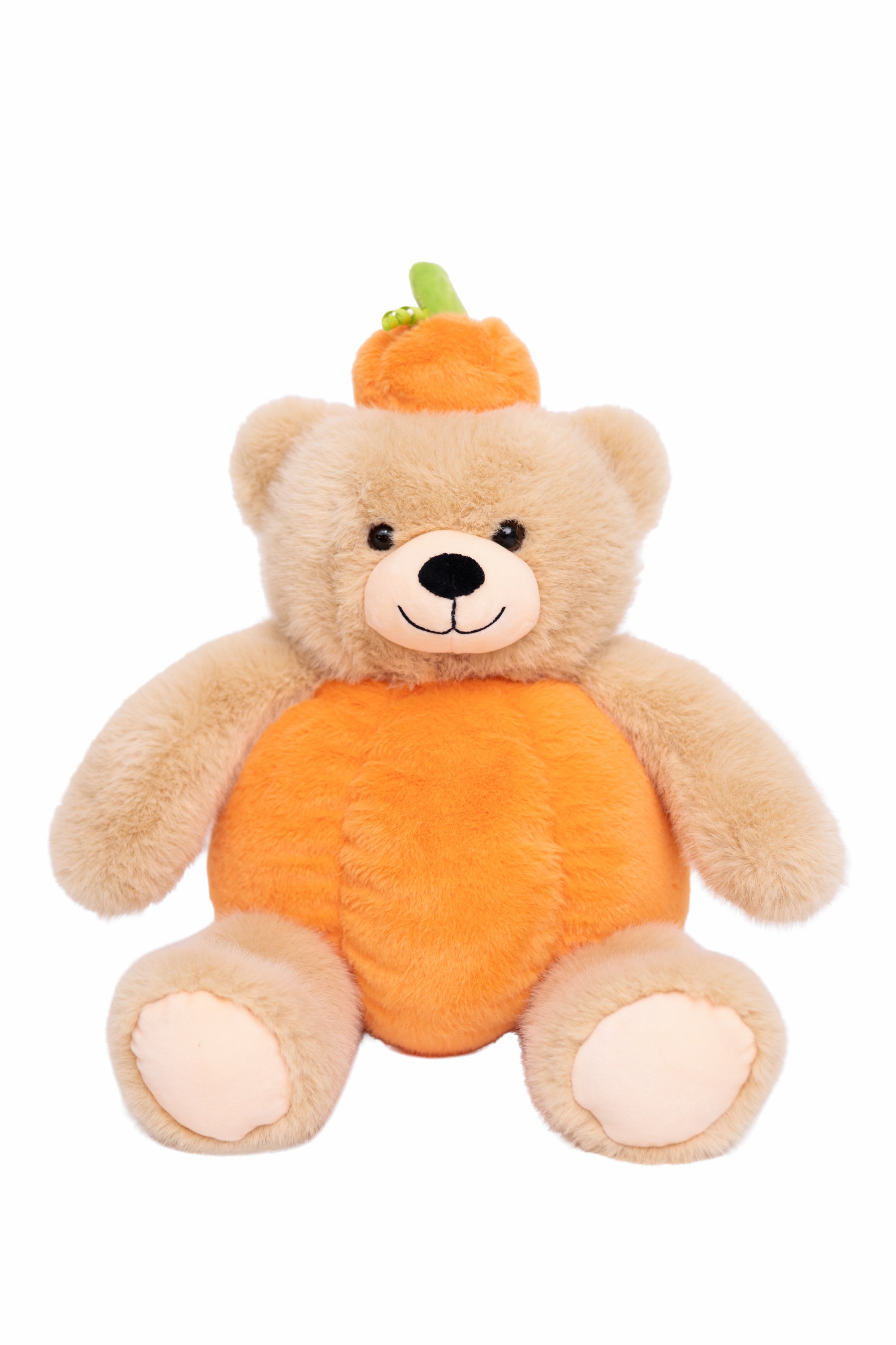 A plush teddy bear dressed as a pumpkin, featuring a beige body, a bright orange pumpkin-shaped belly, and a small orange hat with a green stem, set against a plain white background.