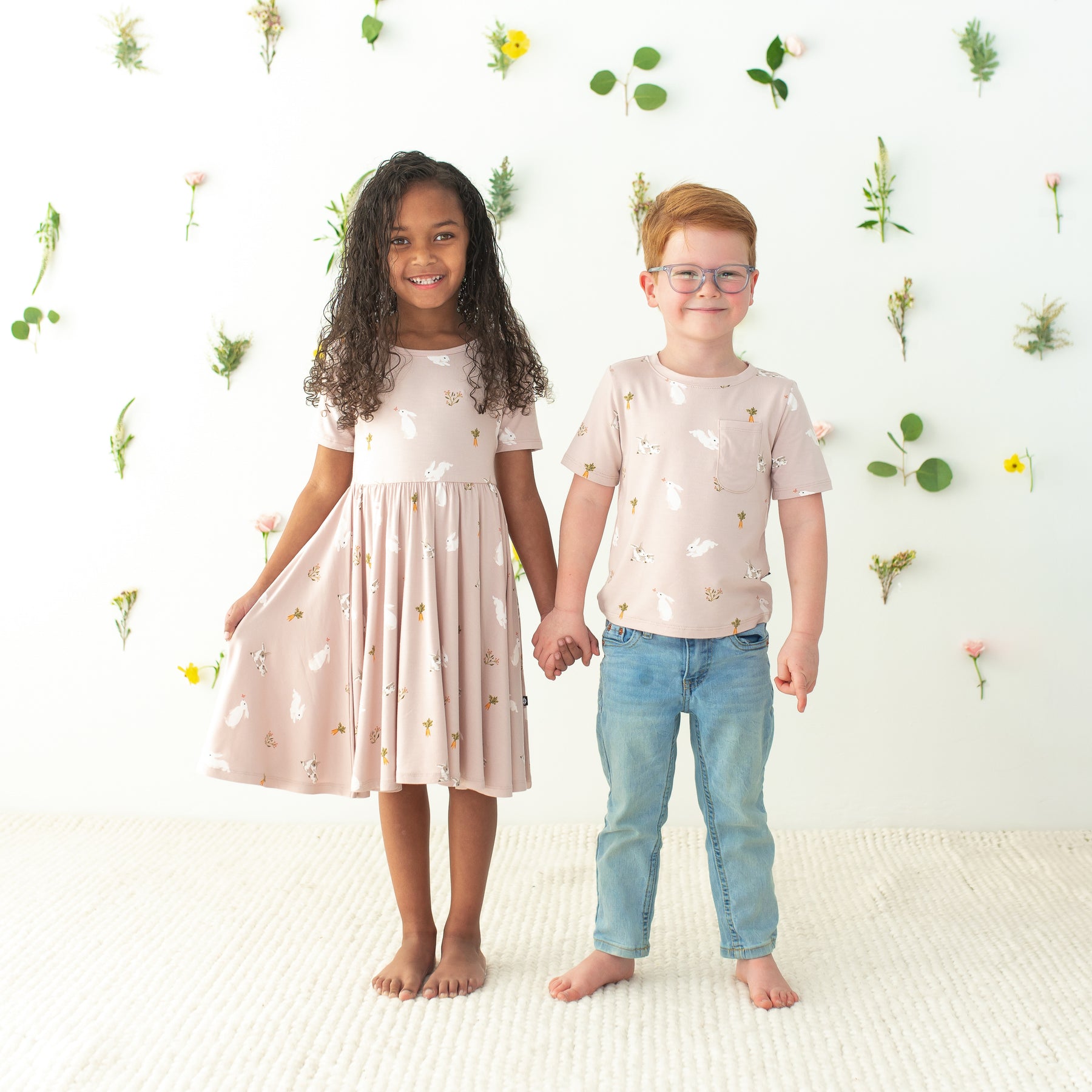 2 toddlers wearing Blush Rabbit twirl dress and toddler crew neck tee