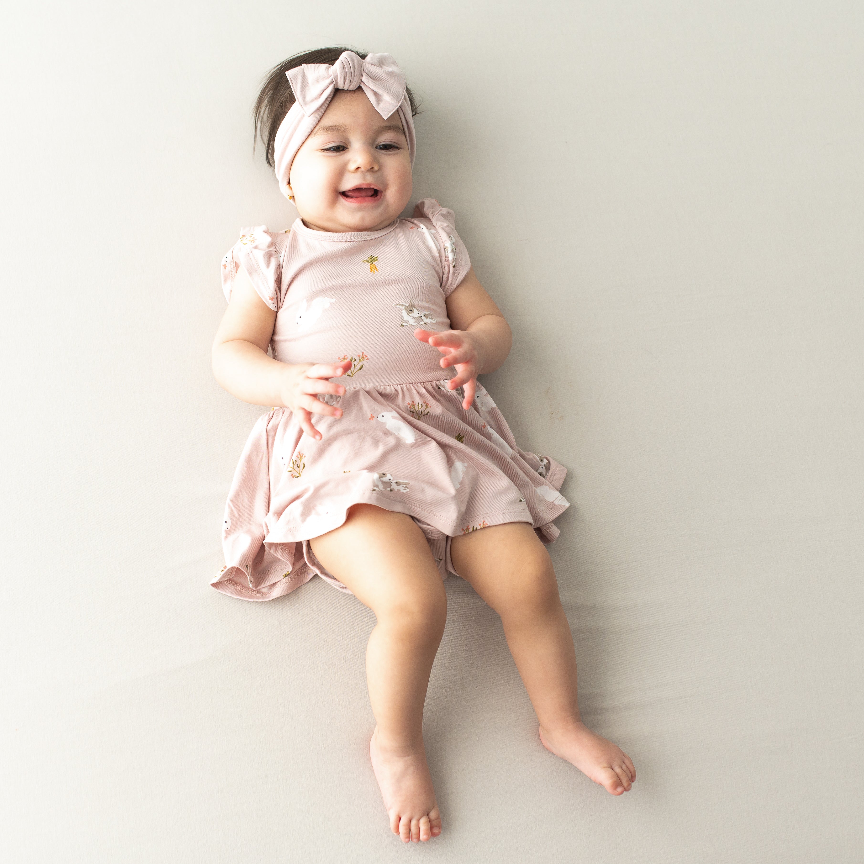 Baby in Twirl Bodysuit Dress in Blush Rabbit and blush bow