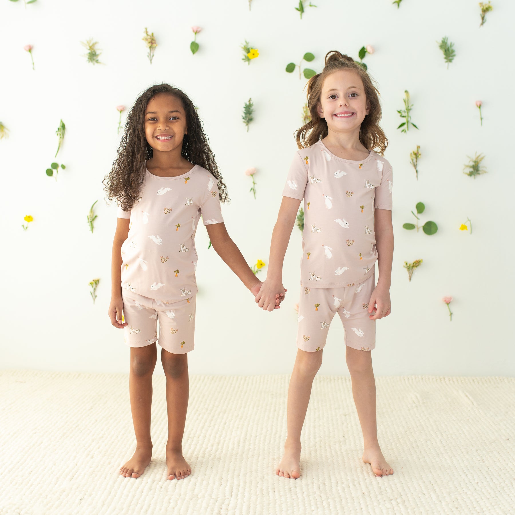 2 kids modeling Short Sleeve Pajamas in Blush Rabbit