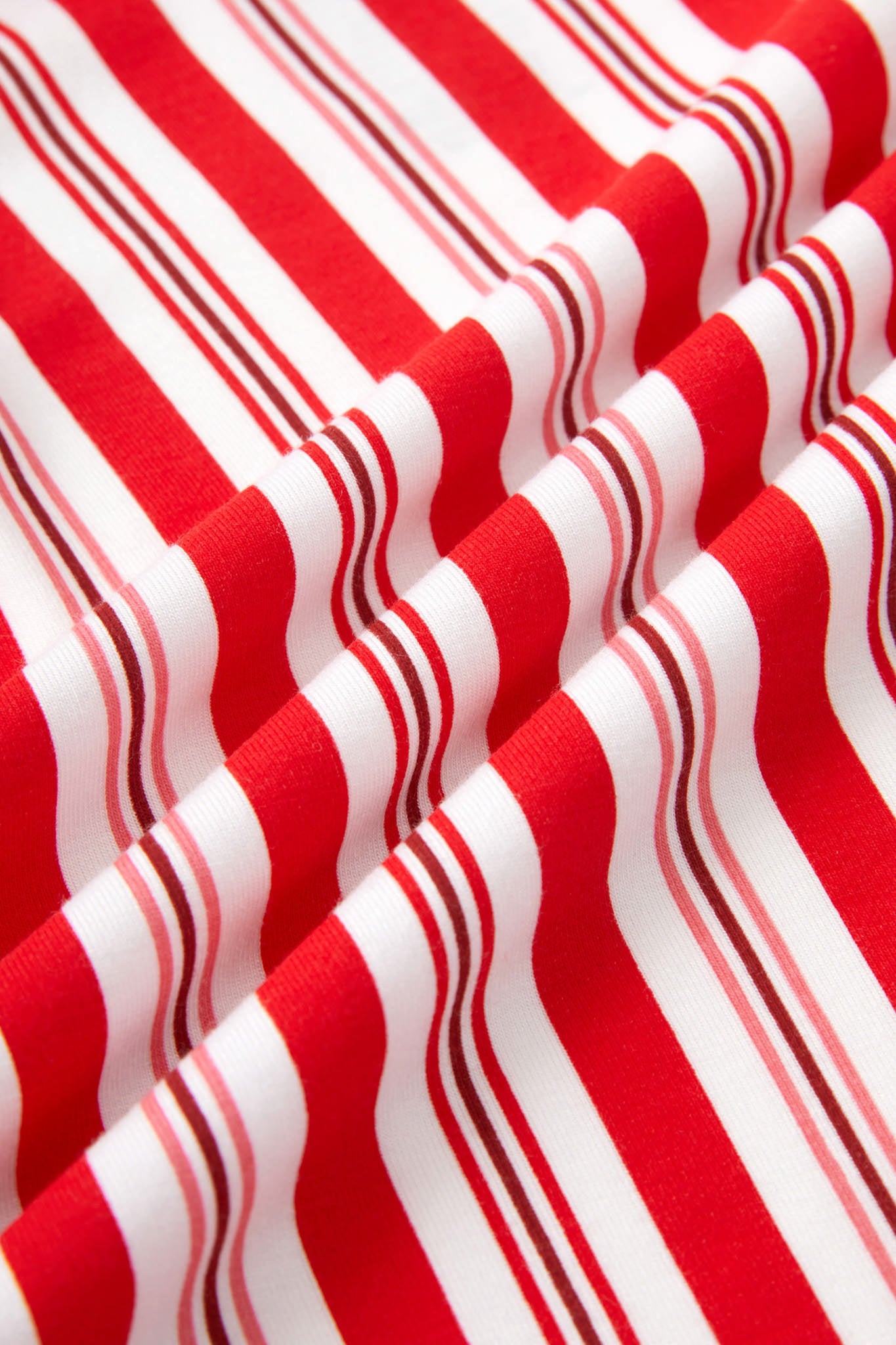 Close up of Red and white peppermint stripes fabric 
