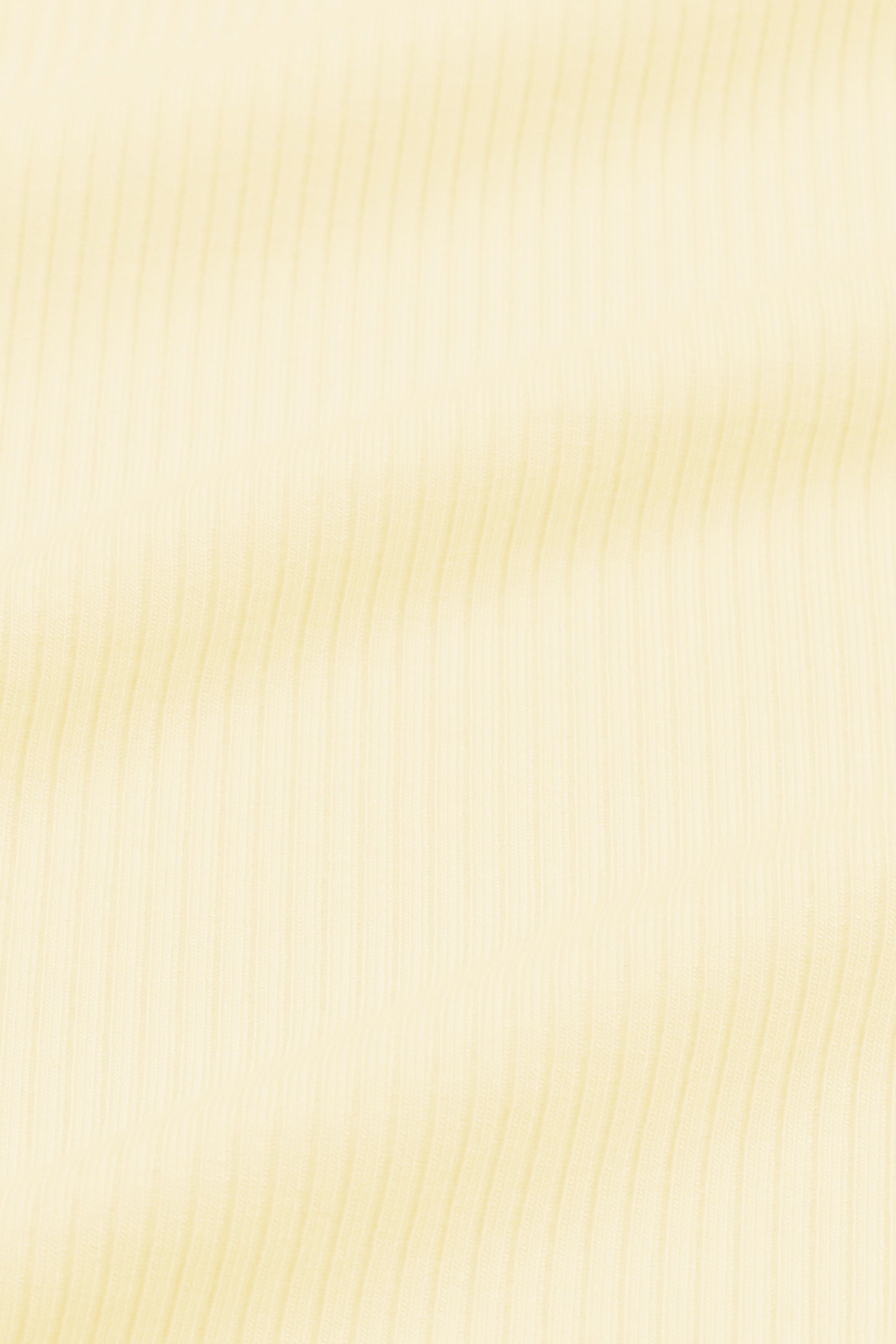 Close up of the ribbed fabric: A muted pastel yellow