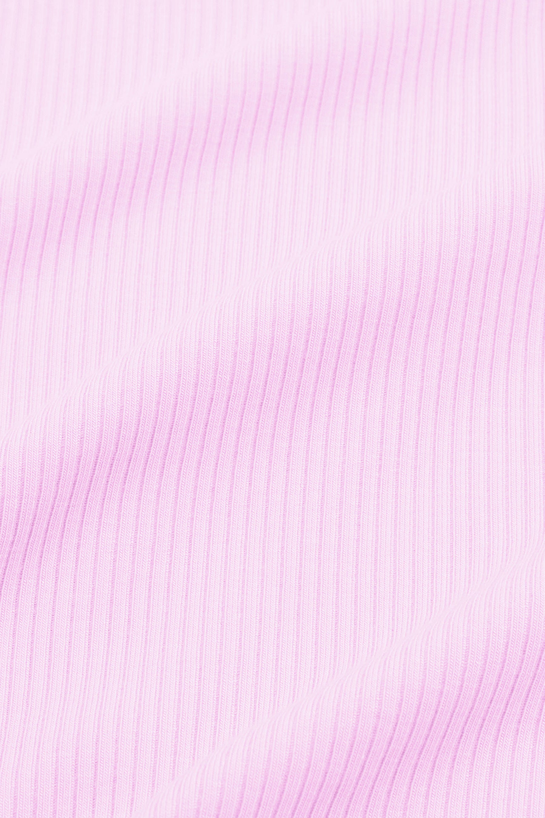 Close up of the ribbed fabric: A pinkish lilac