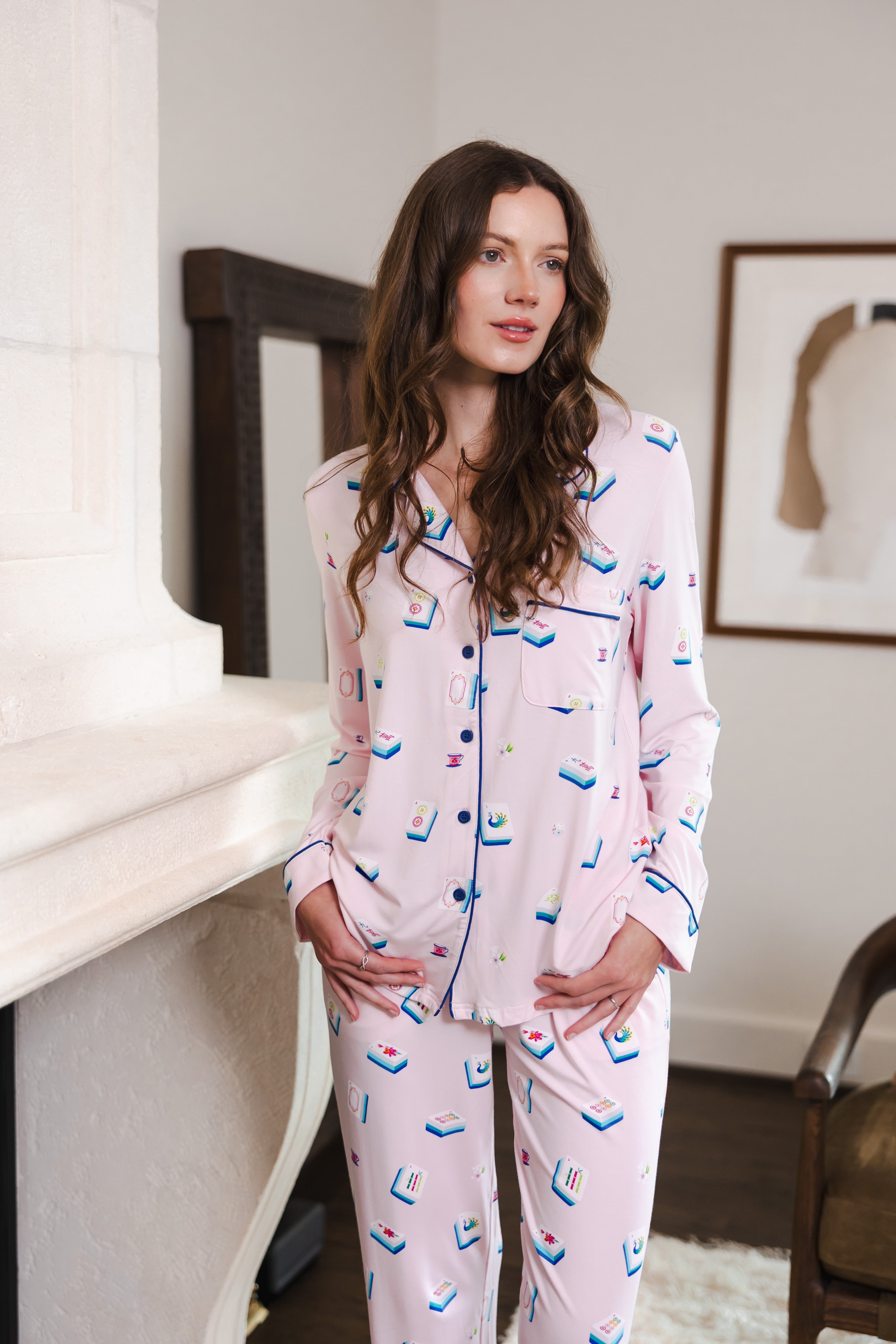 Modal posing in Long-Sleeved Women's Pajama Set in Sakura Mahjong print standing in a room