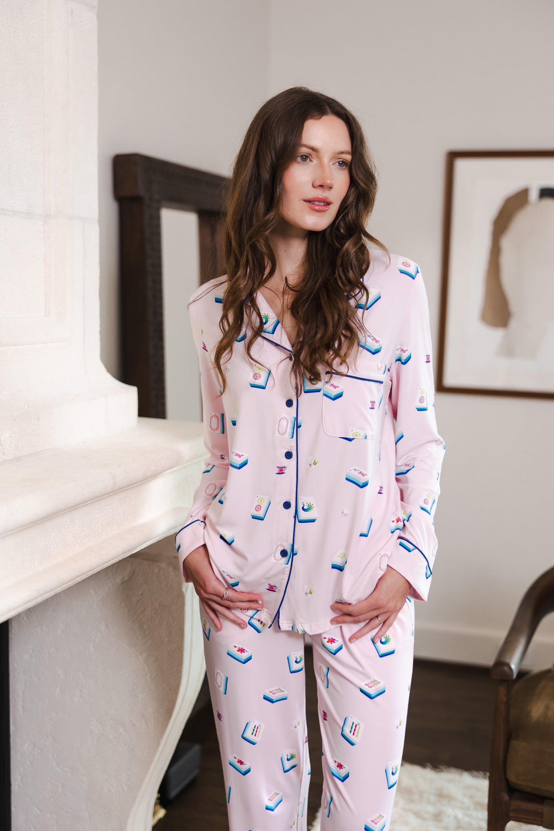 Modal posing in Long-Sleeved Women's Pajama Set in Sakura Mahjong print standing in a room
