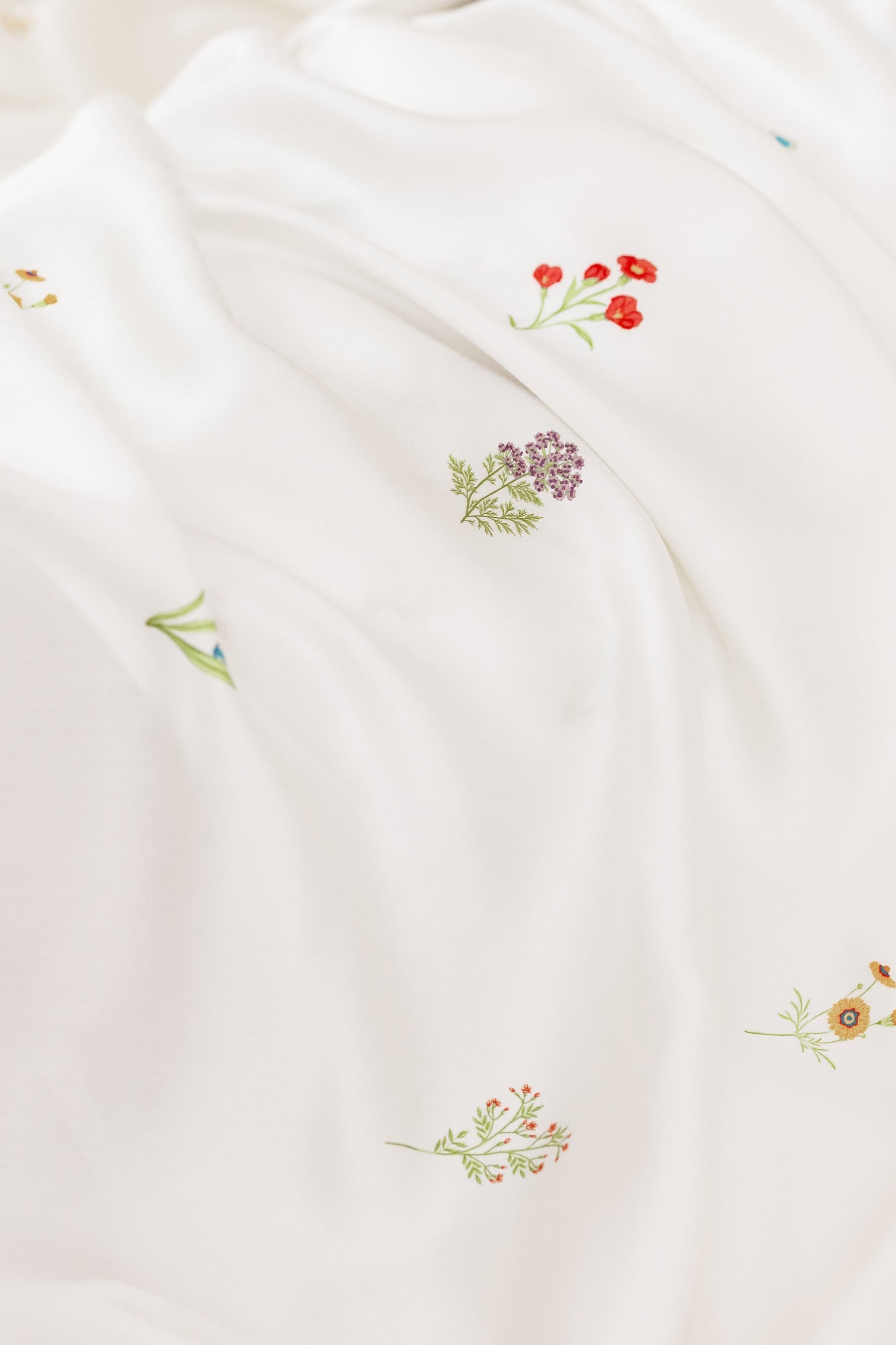 White fabric with small floral pattern