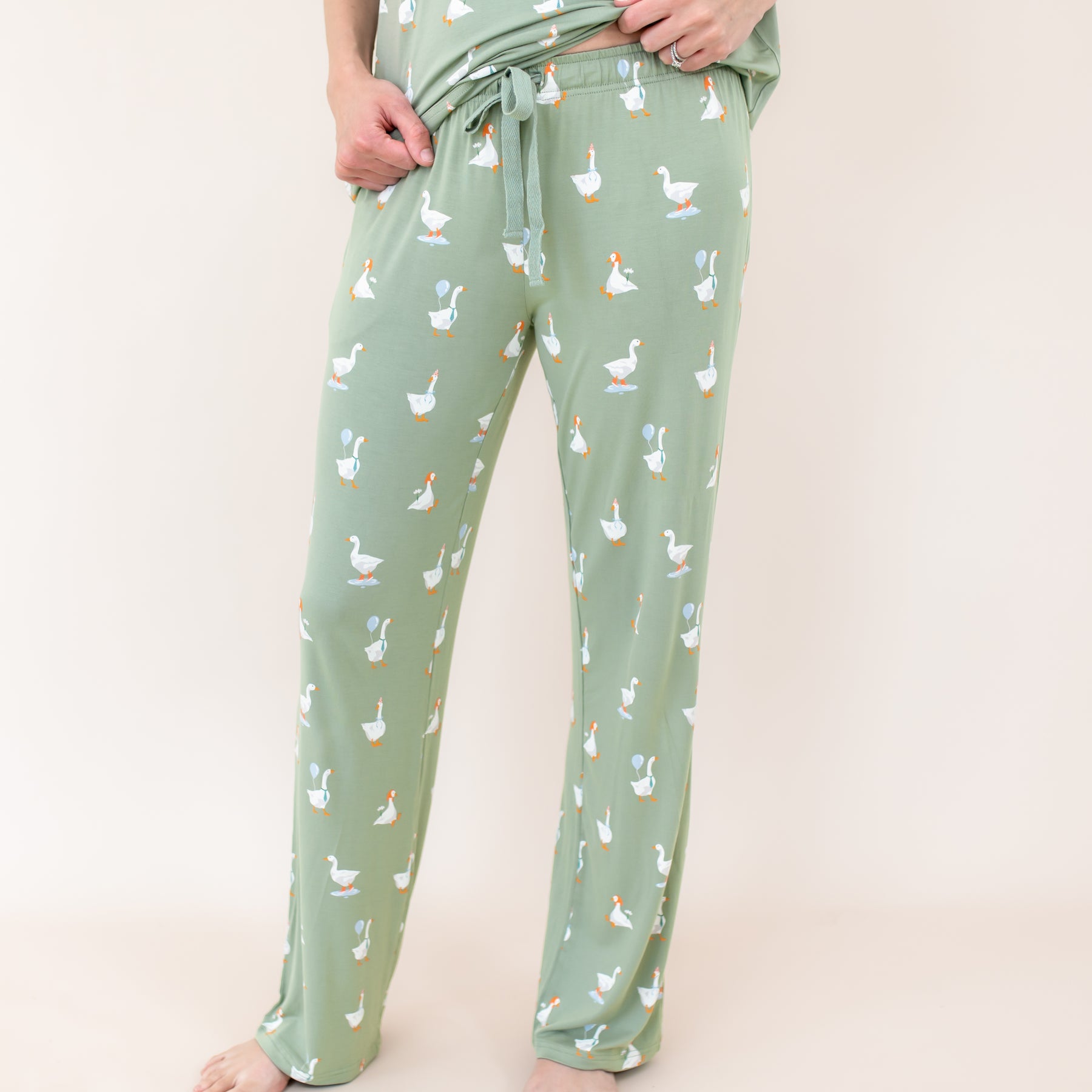 Women's Lounge Pants in Silly Goose shown on a female model in front of a light neutral background