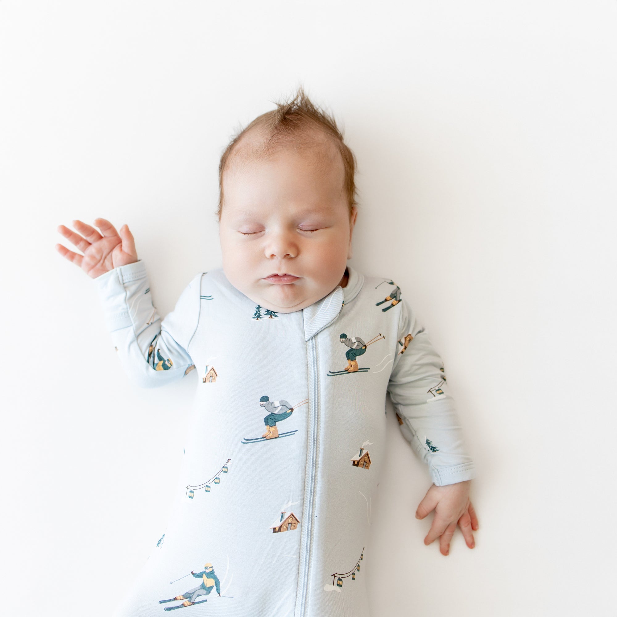 Close up of the Zippered Footie in Ski show on a sleeping baby