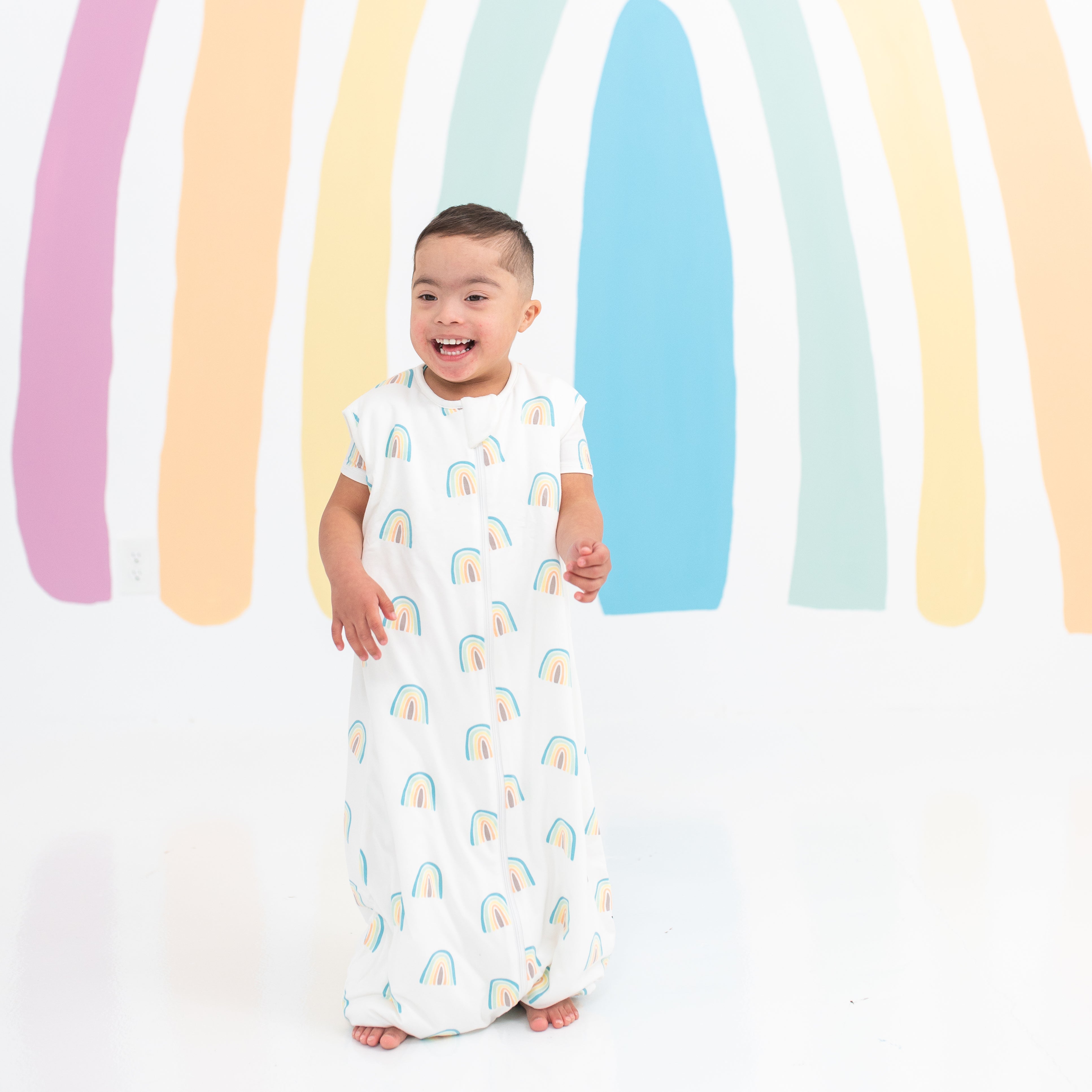 Toddler modeling Sleep Bag Walker in Makai Rainbow 1.0