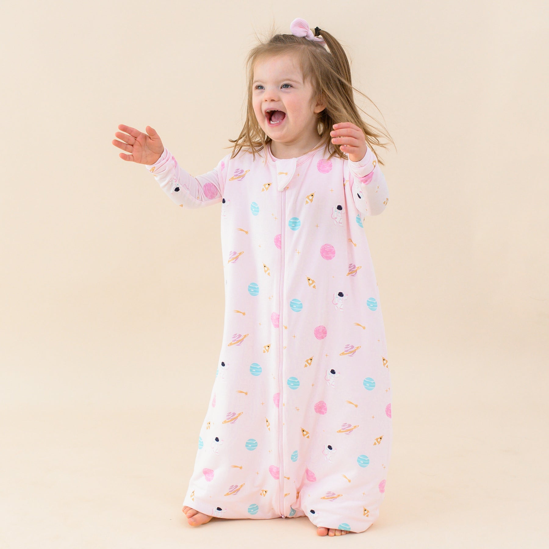 toddler wearing sakura space sleep bag walker