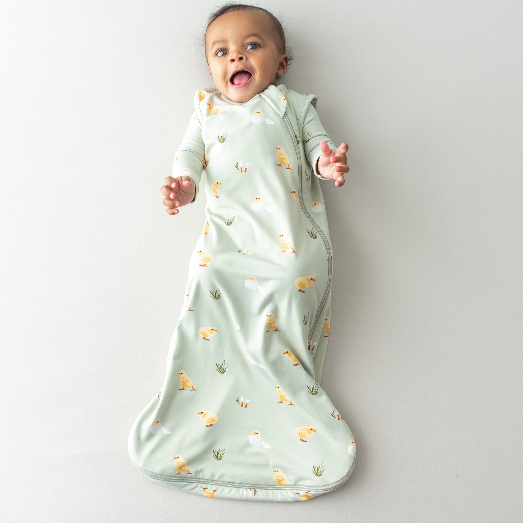 Baby in Sleep Bag in Aloe Chick 0.5