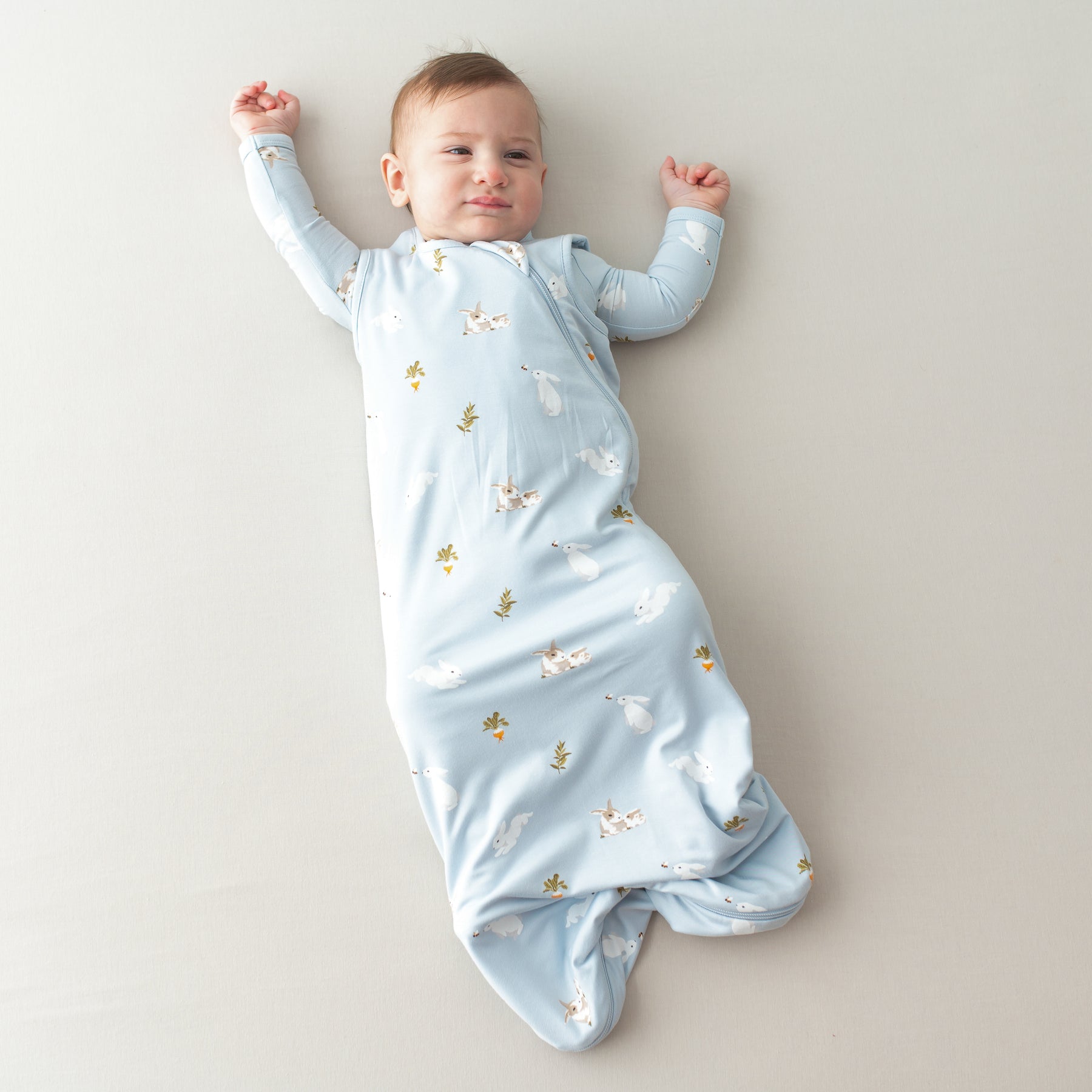 Baby wearing Sleep Bag in Ice Rabbit 0.5