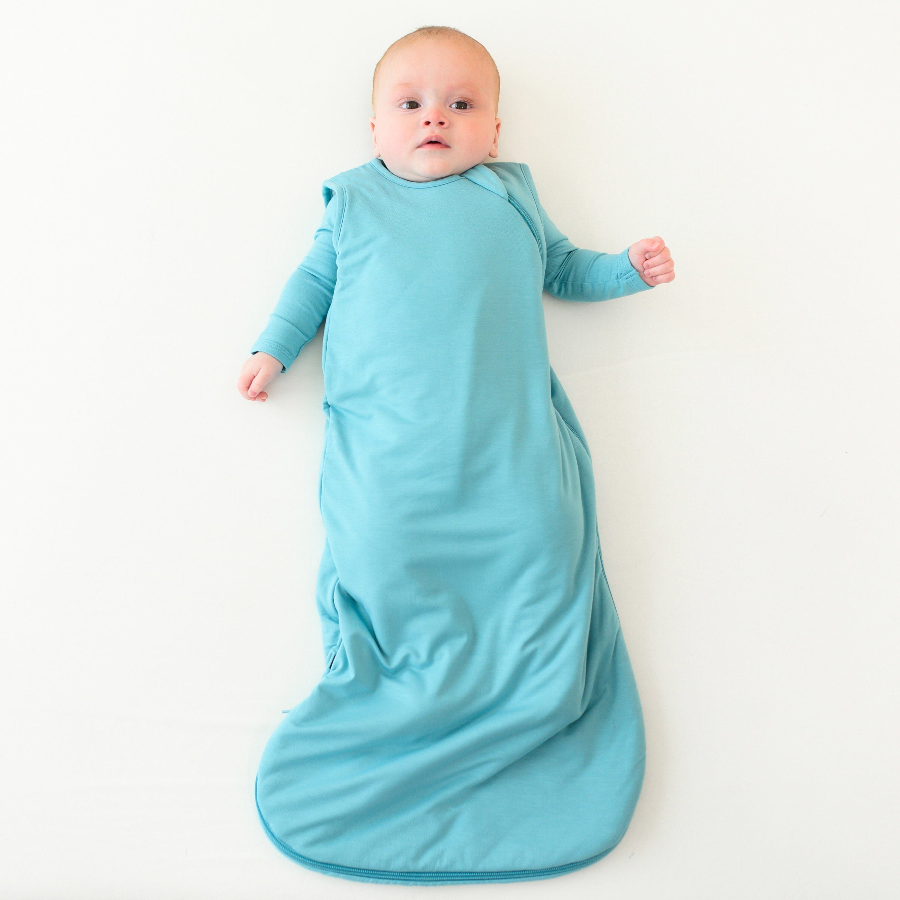 baby modeling 1.0 sleep bag in makai 