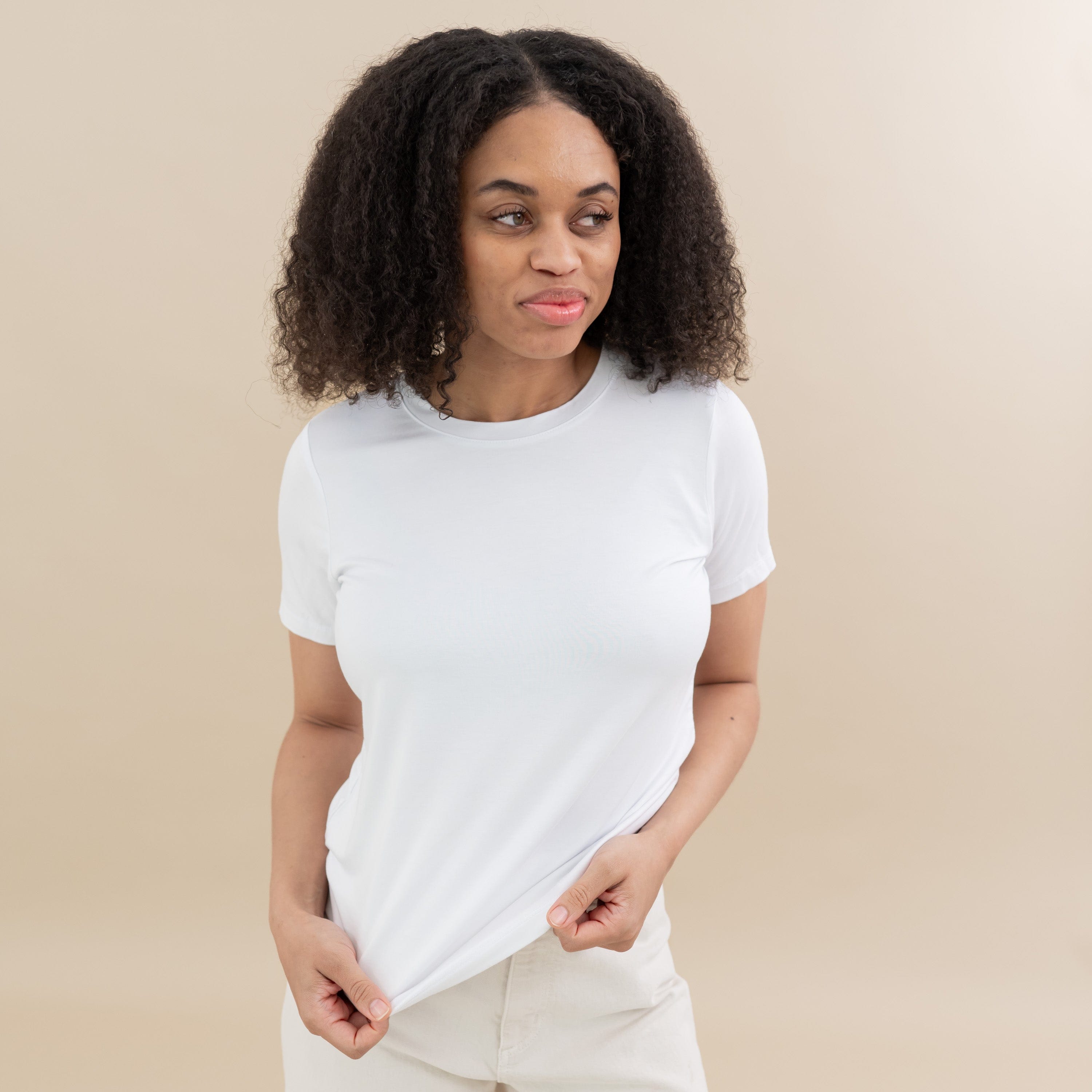 Woman wearing Women's Crew Neck Tee in Snow