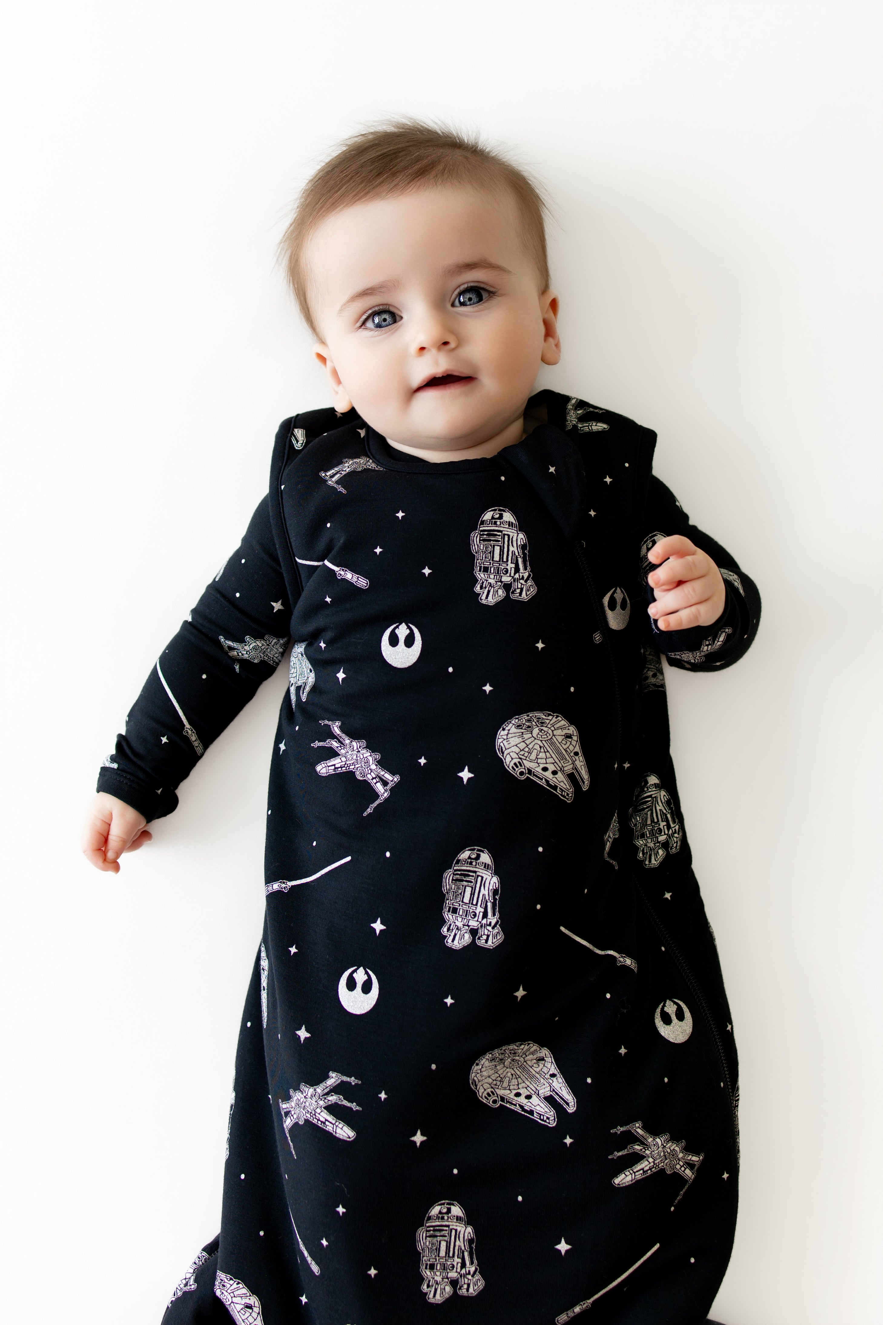 Close up of toddler wearing the Sleep Bag in STAR WARS™ 1.0 with matching romper on underneath