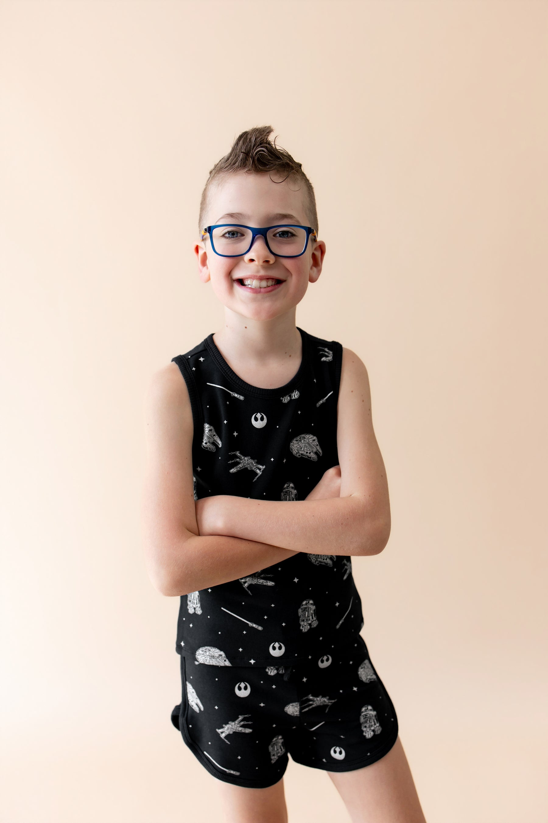 Close up of young boy modeling the Tank Jogger Set in STAR WARS™