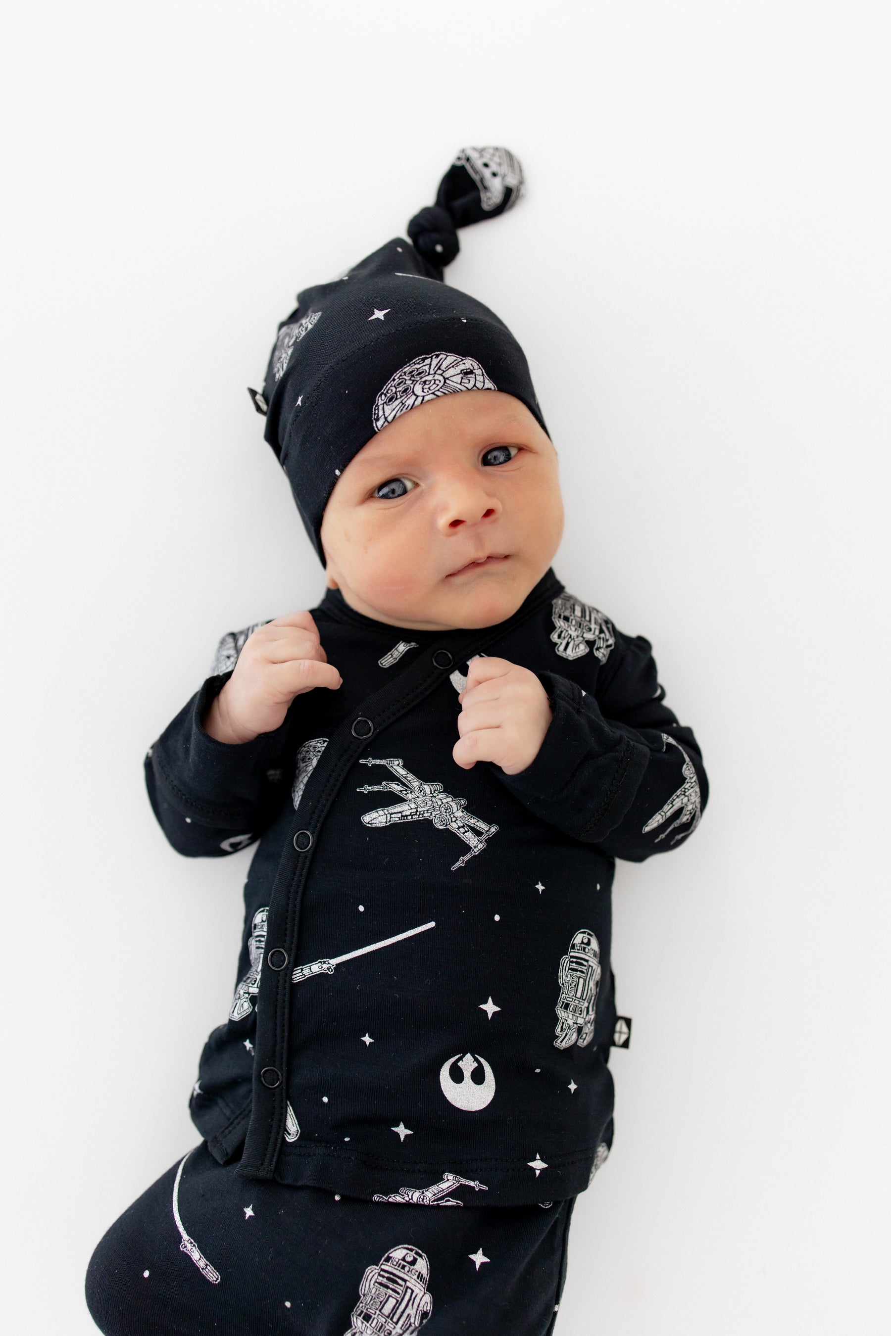 Close up of infant wearing the Take Me Home Set with Cap in STAR WARS™