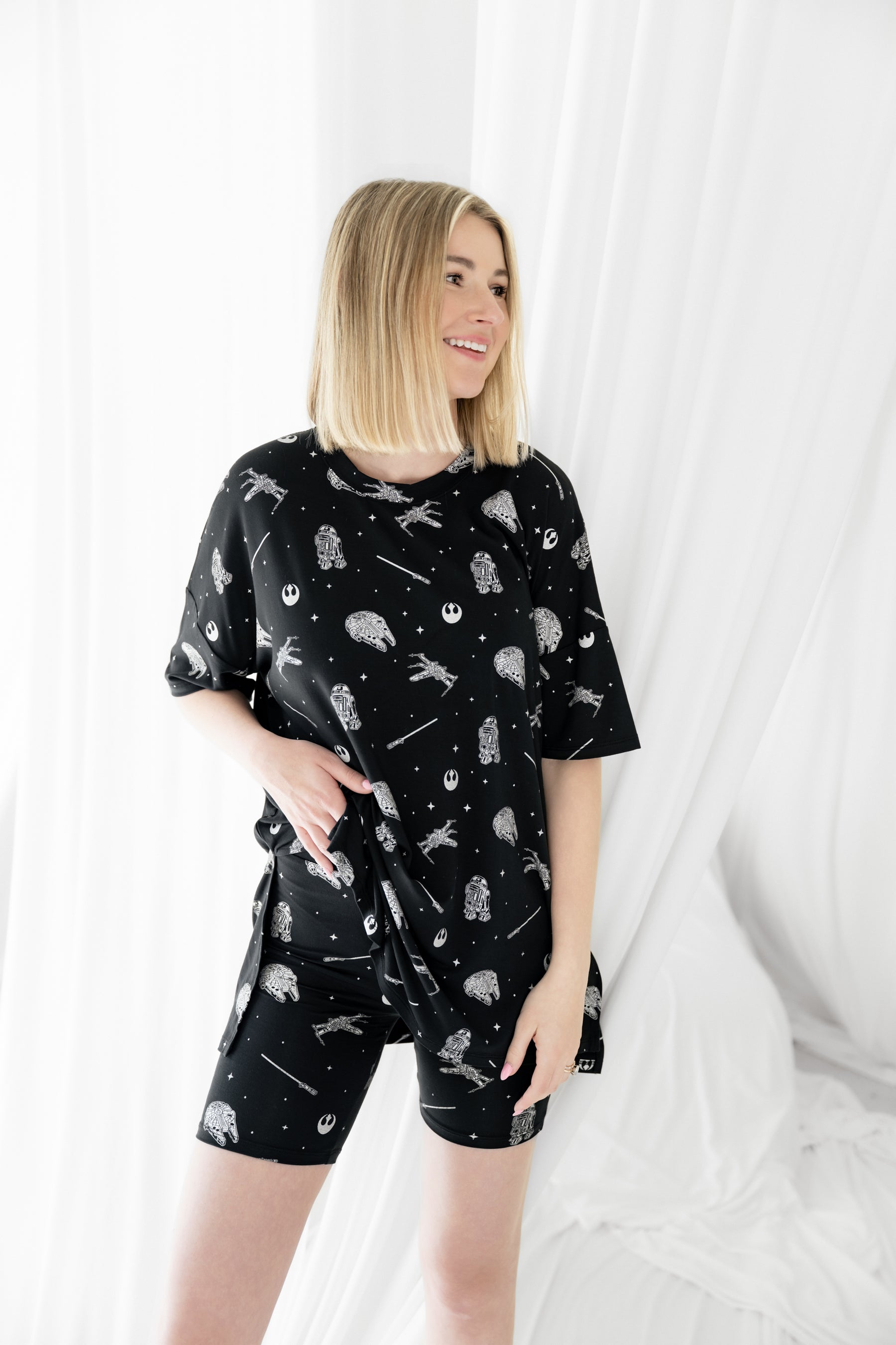 Female modeling the Women’s Biker Short Set in STAR WARS™ in front of a white background