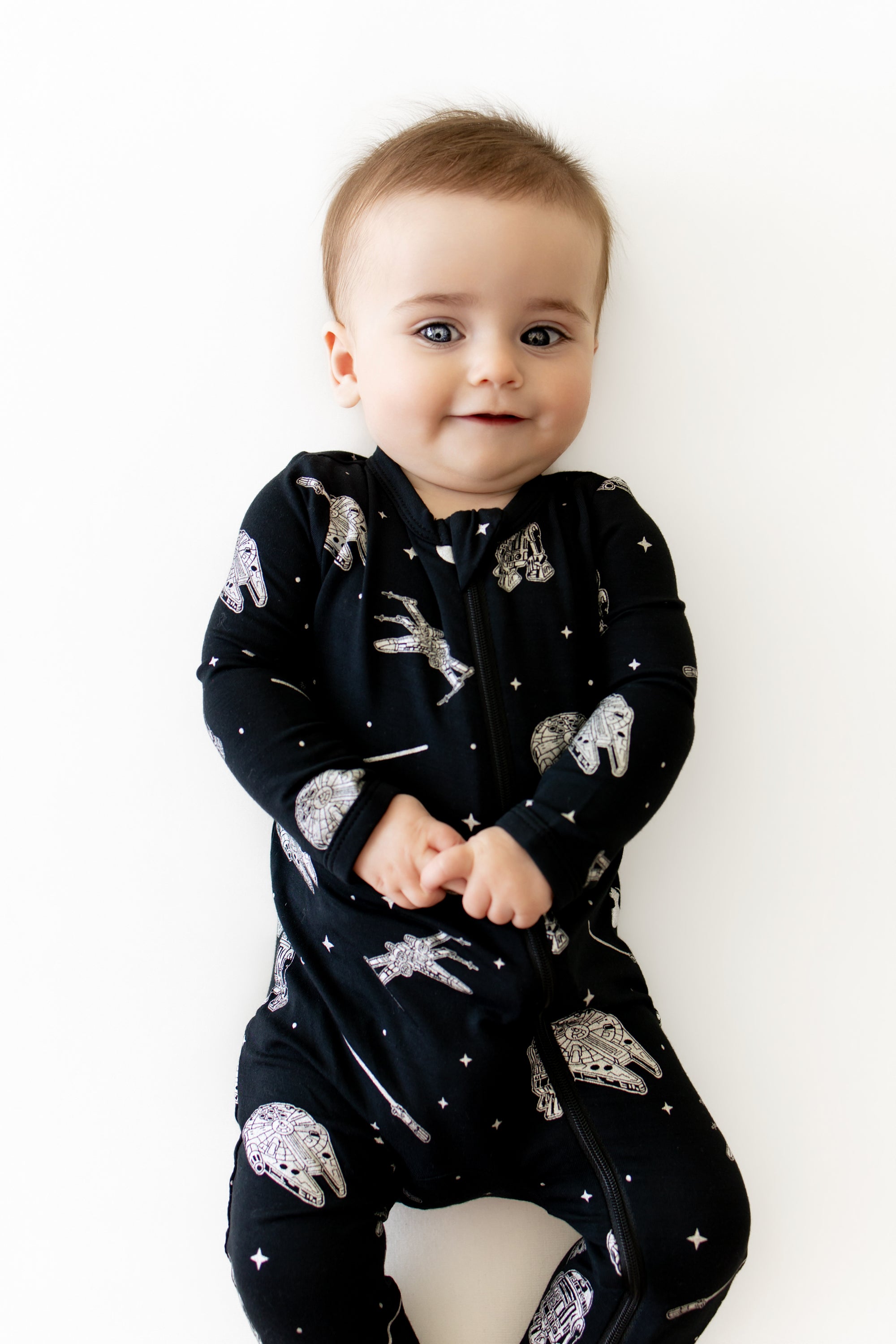 Close up of infant wearing the Zippered Romper in STAR WARS™