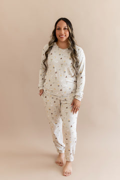 Women wearing a cream joggers set with Harry Potter prints on a beige background