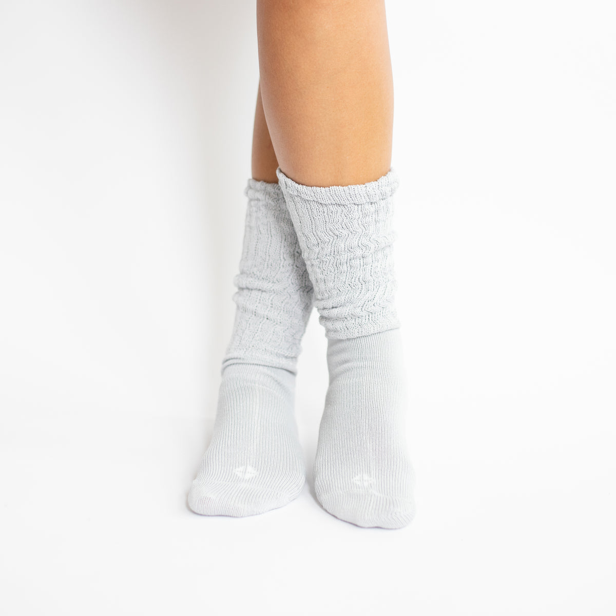 Adult Scrunch Socks in Storm shown on a model
