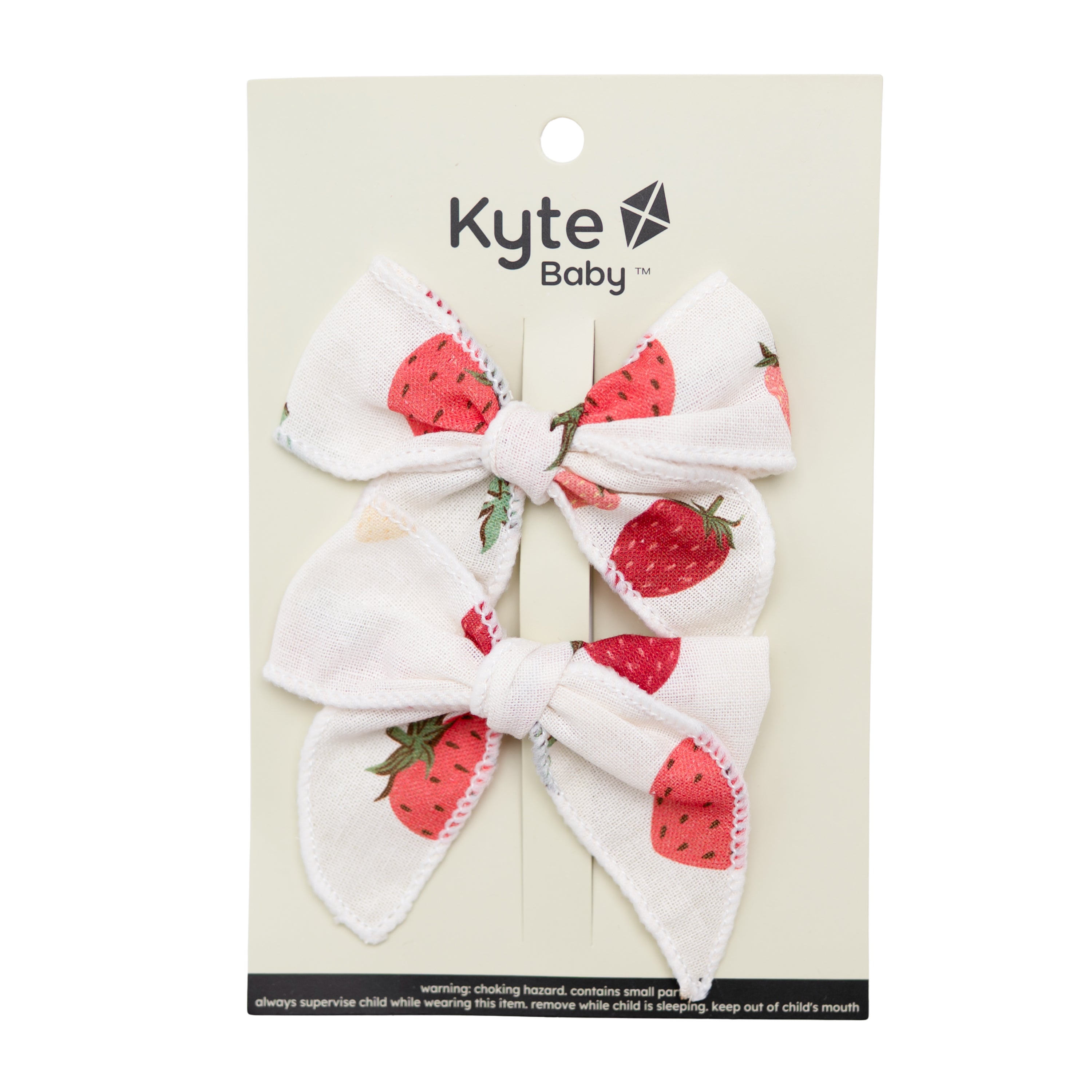 Linen Piggie Bows in Strawberry shown in its packaging