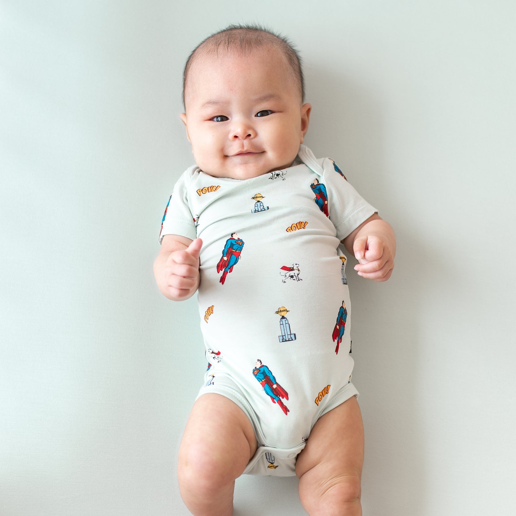 Infant model wearing the Bodysuit in Superman™