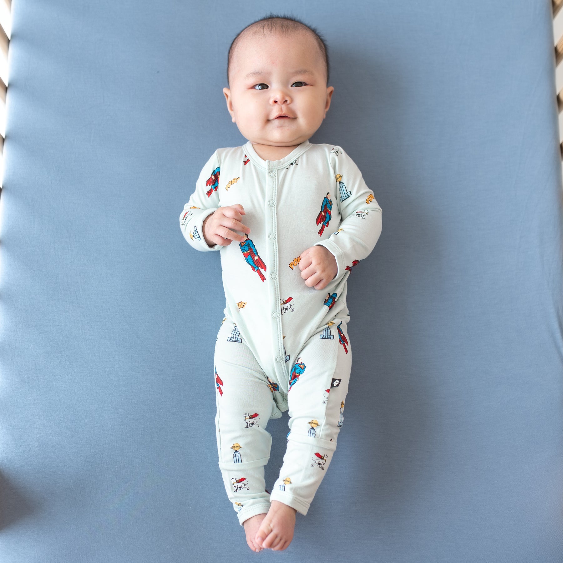 Baby wearing snap Romper in Superman™