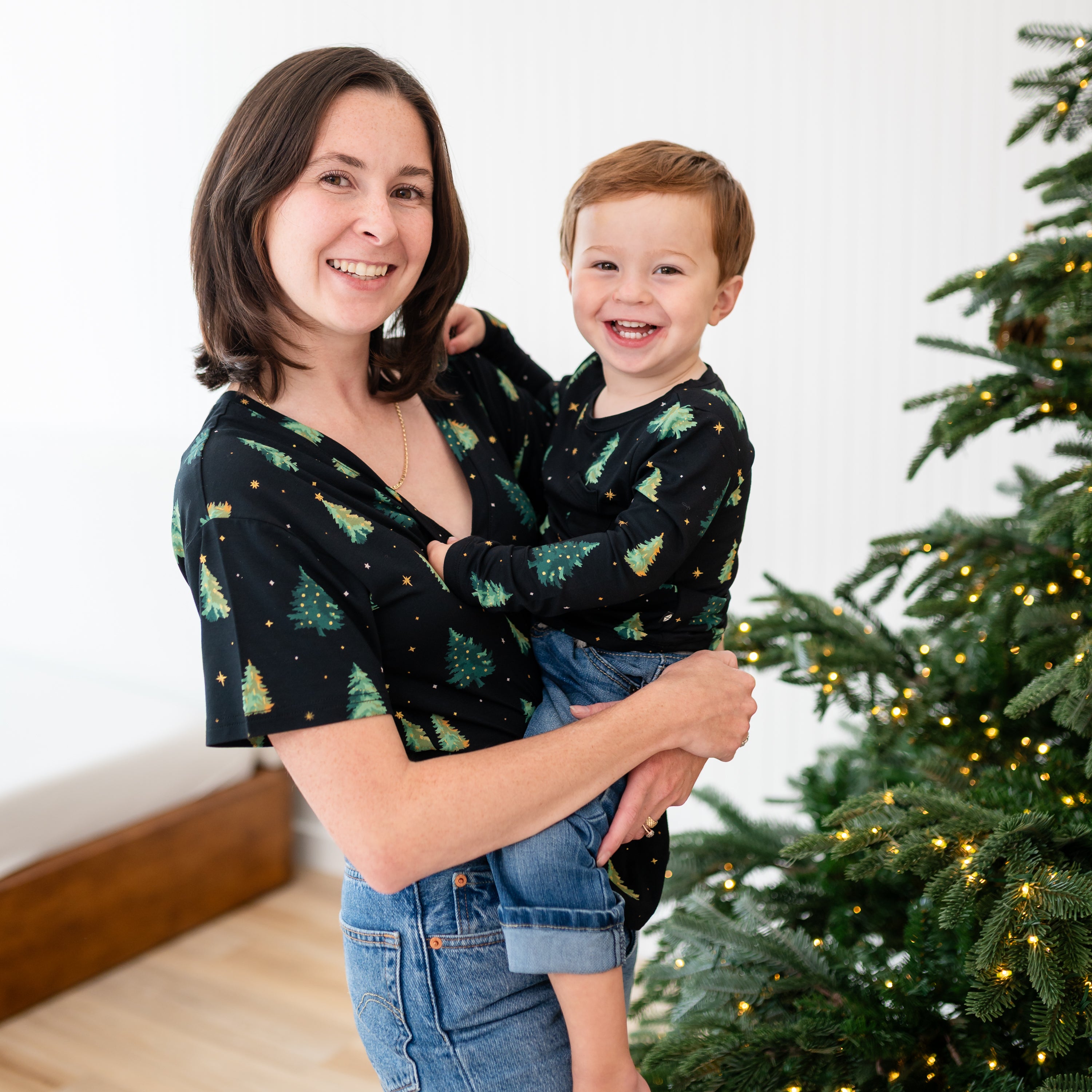 Mother holding son both matching in Twinkle Tree tee's
