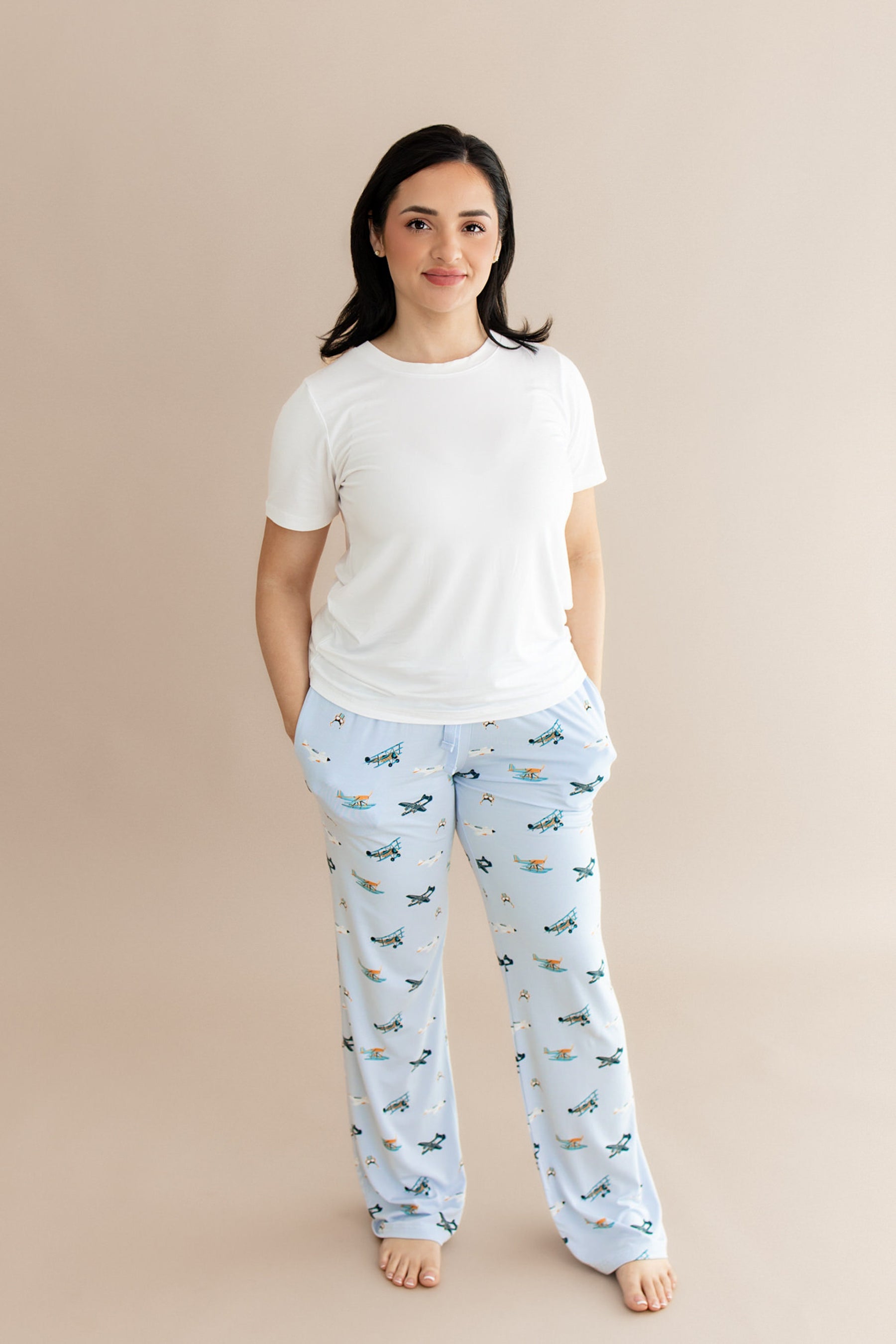 Female modeling the Women's Lounge Pants in Take Off with a white shirt